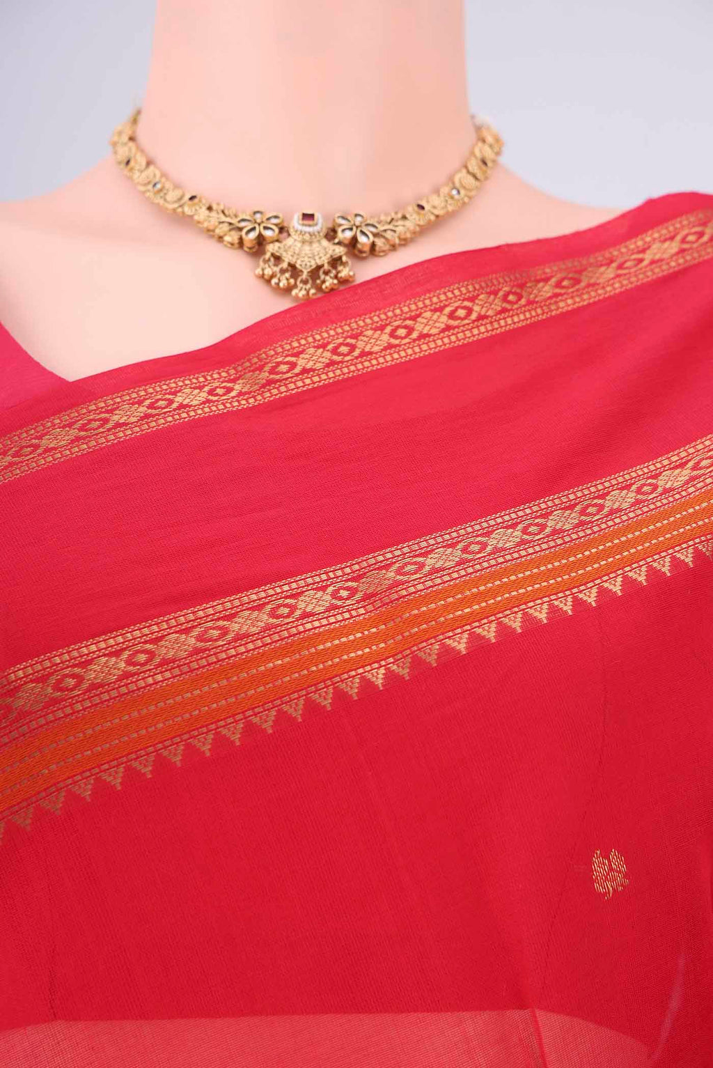 Border image of Red Kanchi Cotton Saree with Zari Butta on the body and Zari Border. 