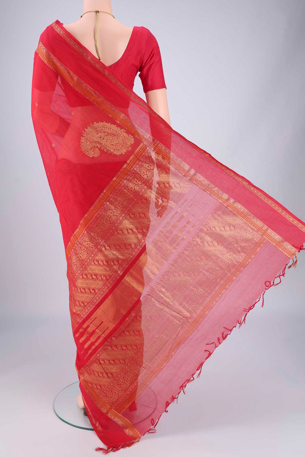 Flat view of Red Kanchi Cotton Saree with Zari Butta on the body and Zari Border. 
