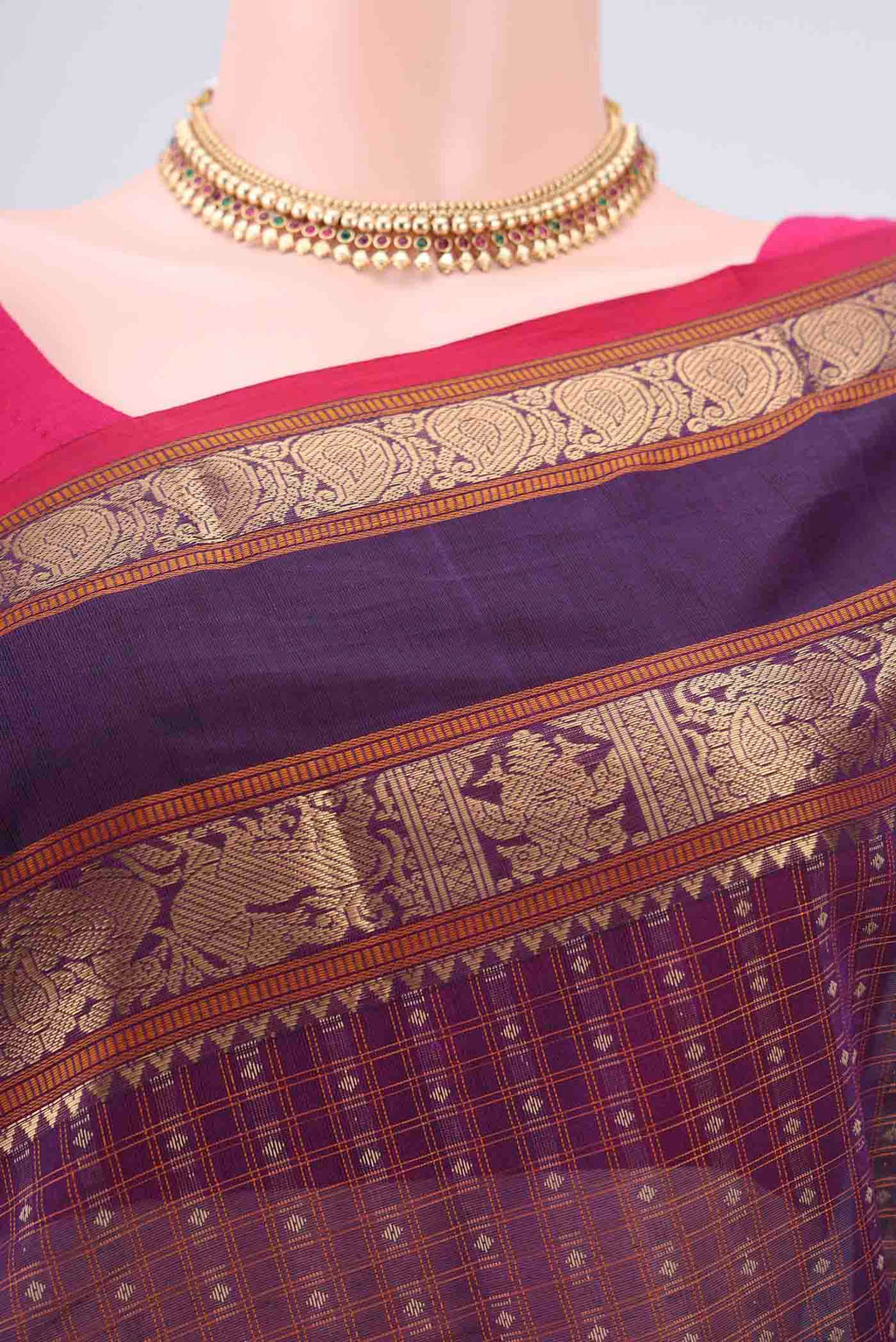 Border image of Purple Kanchi Cotton Saree with Checked design on the body and Zari Border. 