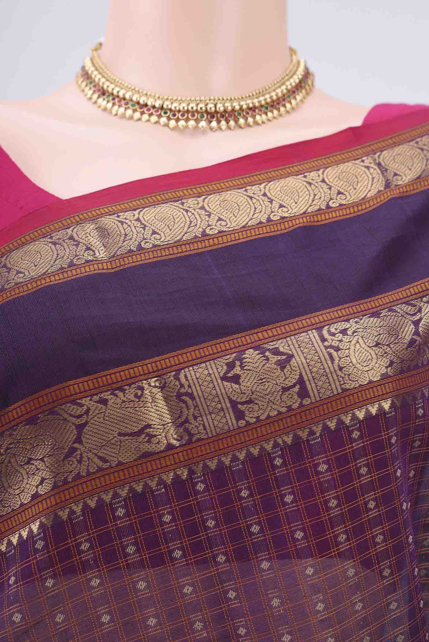 Border image of Purple Kanchi Cotton Saree with Checked design on the body and Zari Border. 