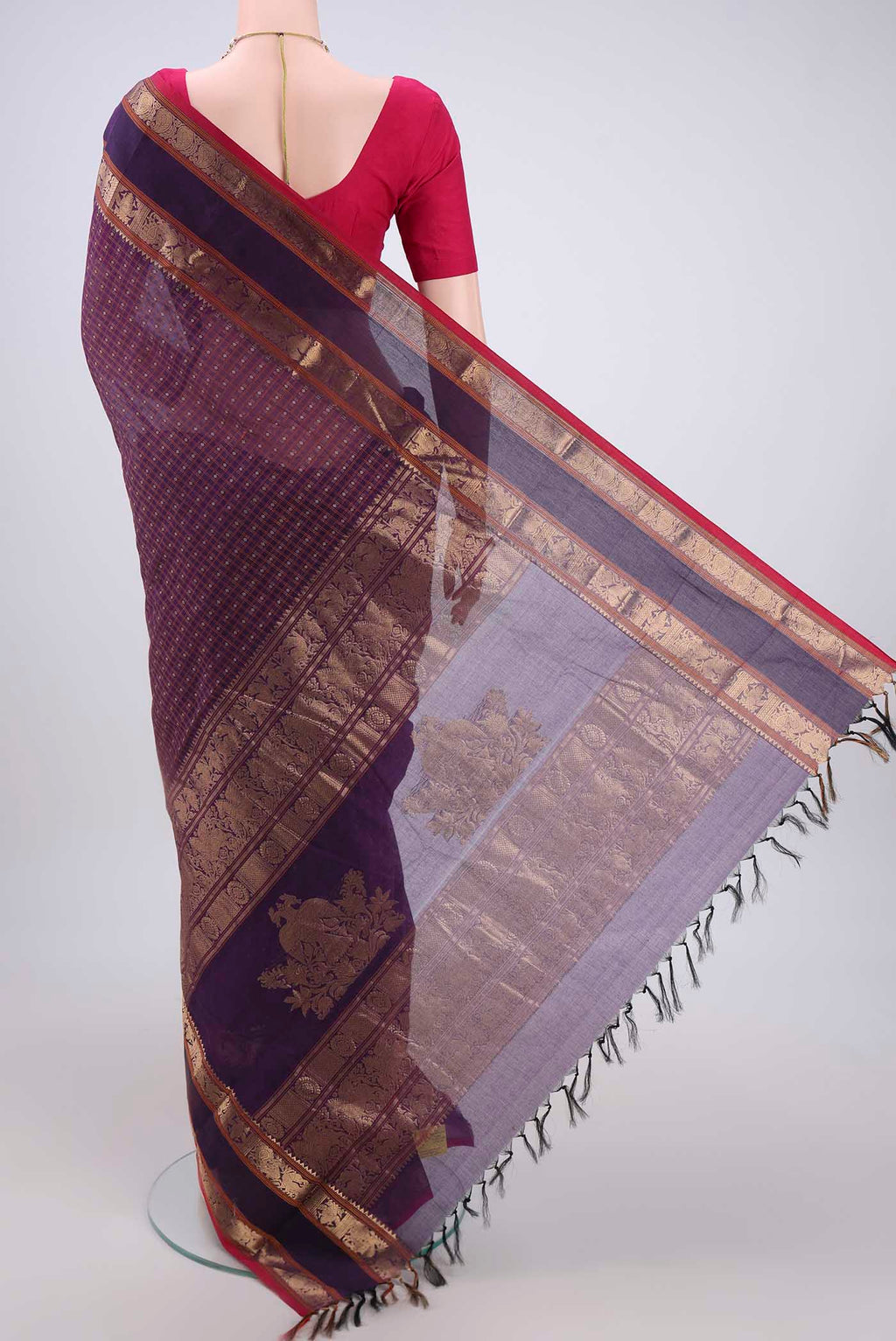 Flat view of Purple Kanchi Cotton Saree with Checked design on the body and Zari Border. 