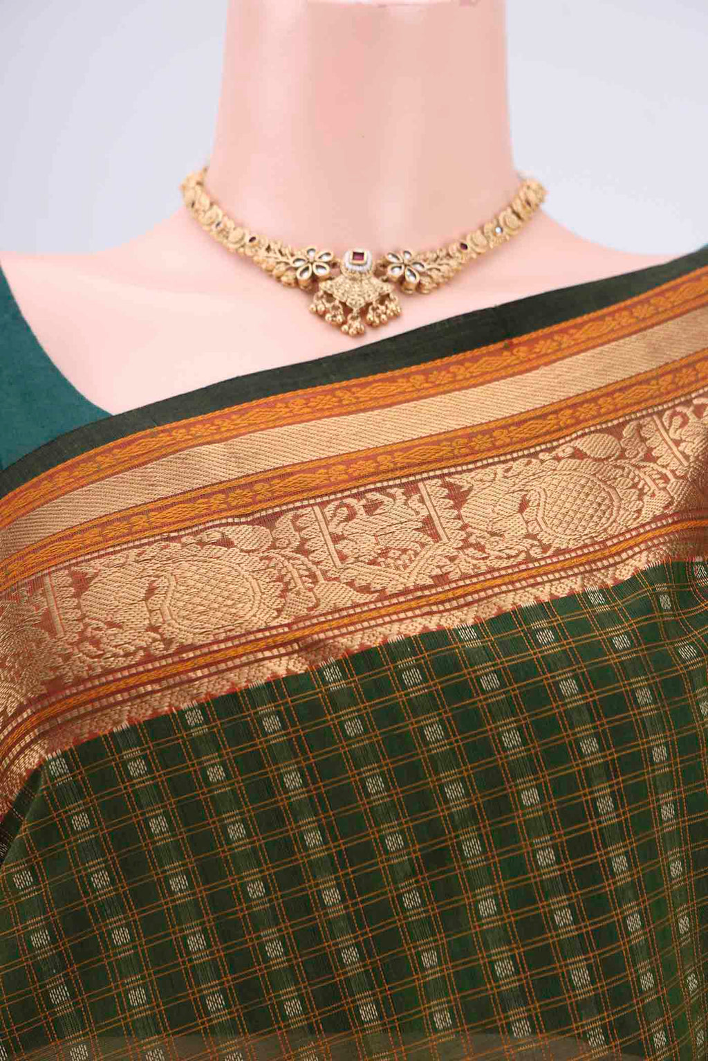 Border image of Bottle Green Kanchi Cotton Saree with Checked design on the body and Zari Border. 