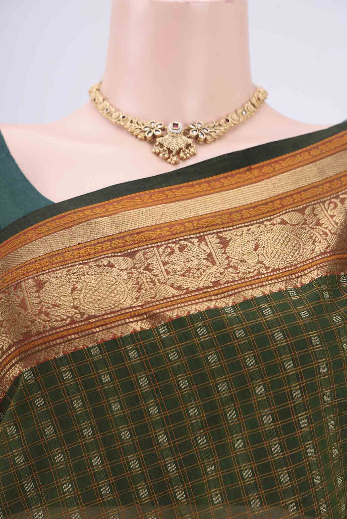 Border image of Bottle Green Kanchi Cotton Saree with Checked design on the body and Zari Border. 