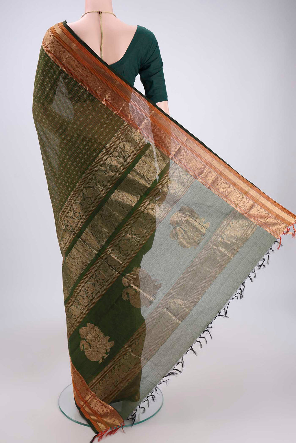 Flat view of Bottle Green Kanchi Cotton Saree with Checked design on the body and Zari Border. 