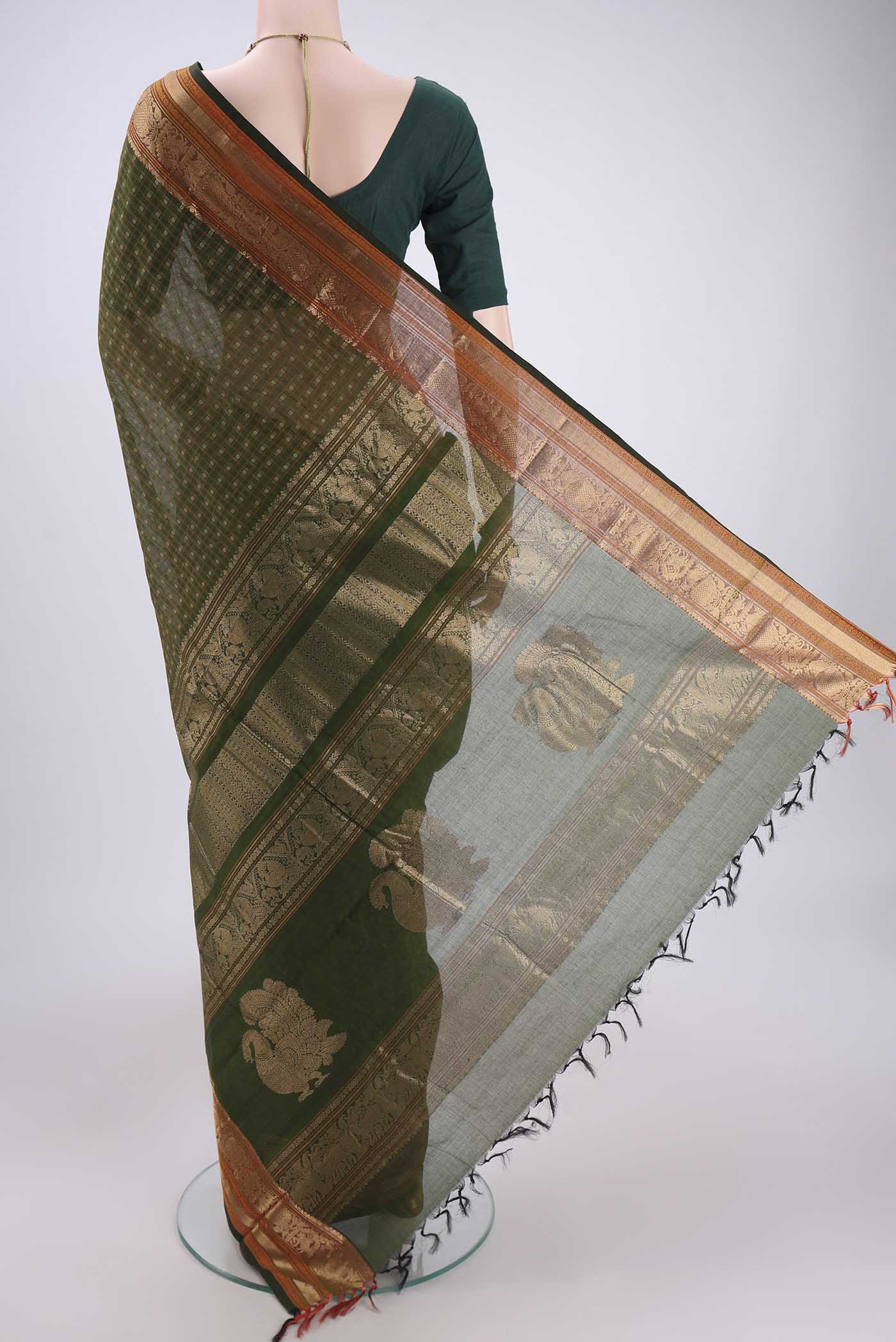 Flat view of Bottle Green Kanchi Cotton Saree with Checked design on the body and Zari Border. 