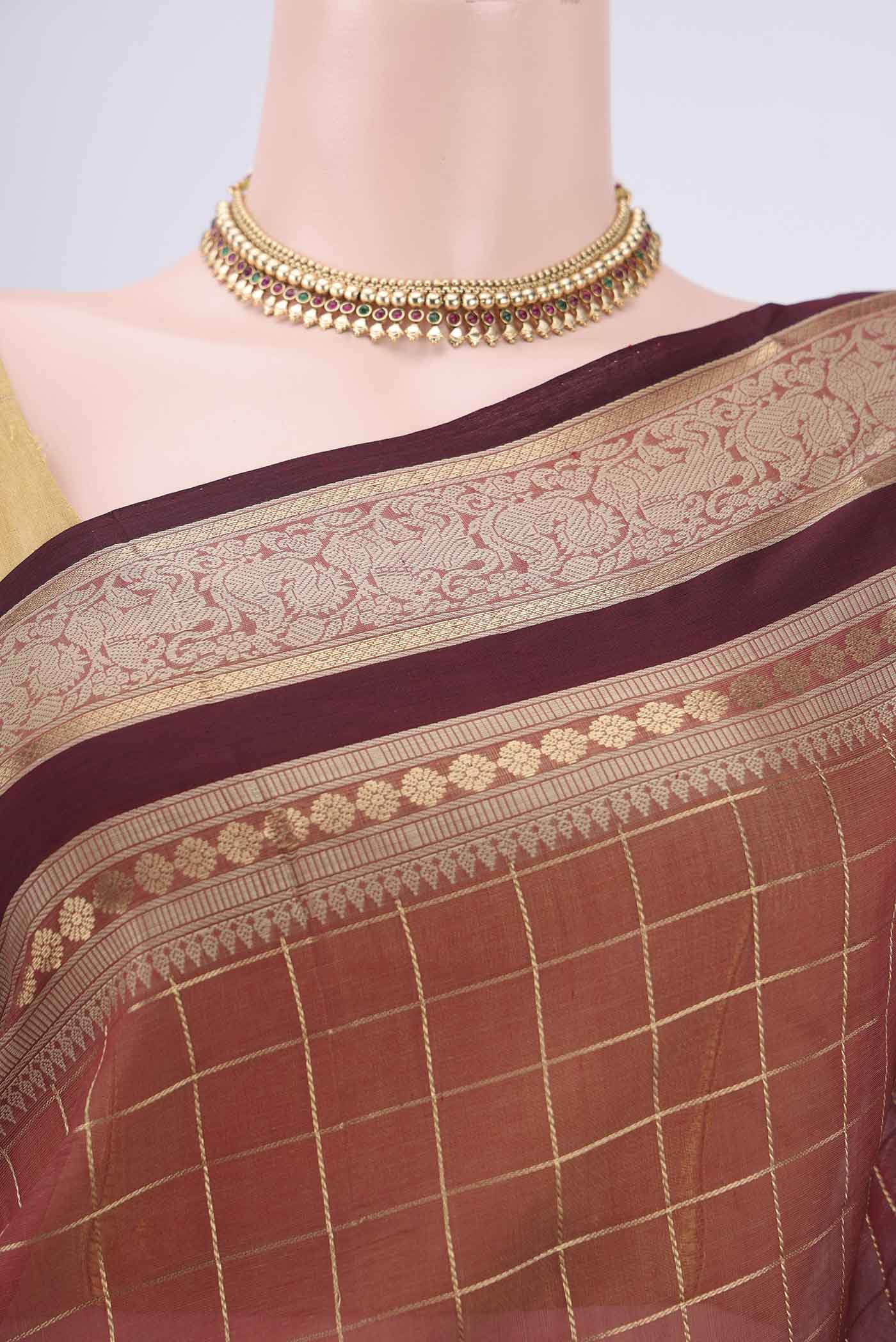 Border image of Brown Kanchi Cotton Saree with Checked design on the body and Zari Border. 