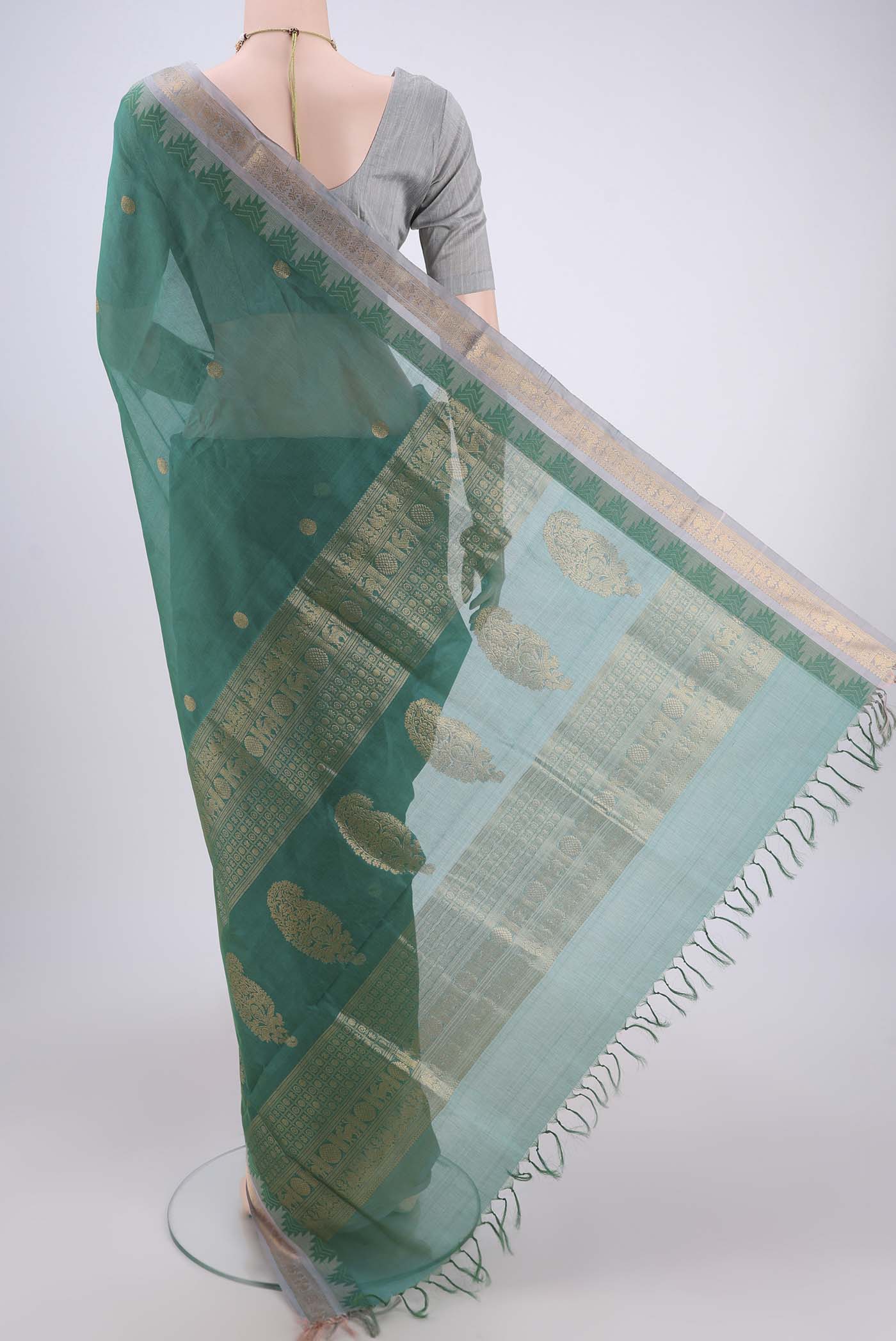 Flat view of Sea Green Coimbatore Silk Cotton Saree with Zari Butta on the body and Zari Border. 