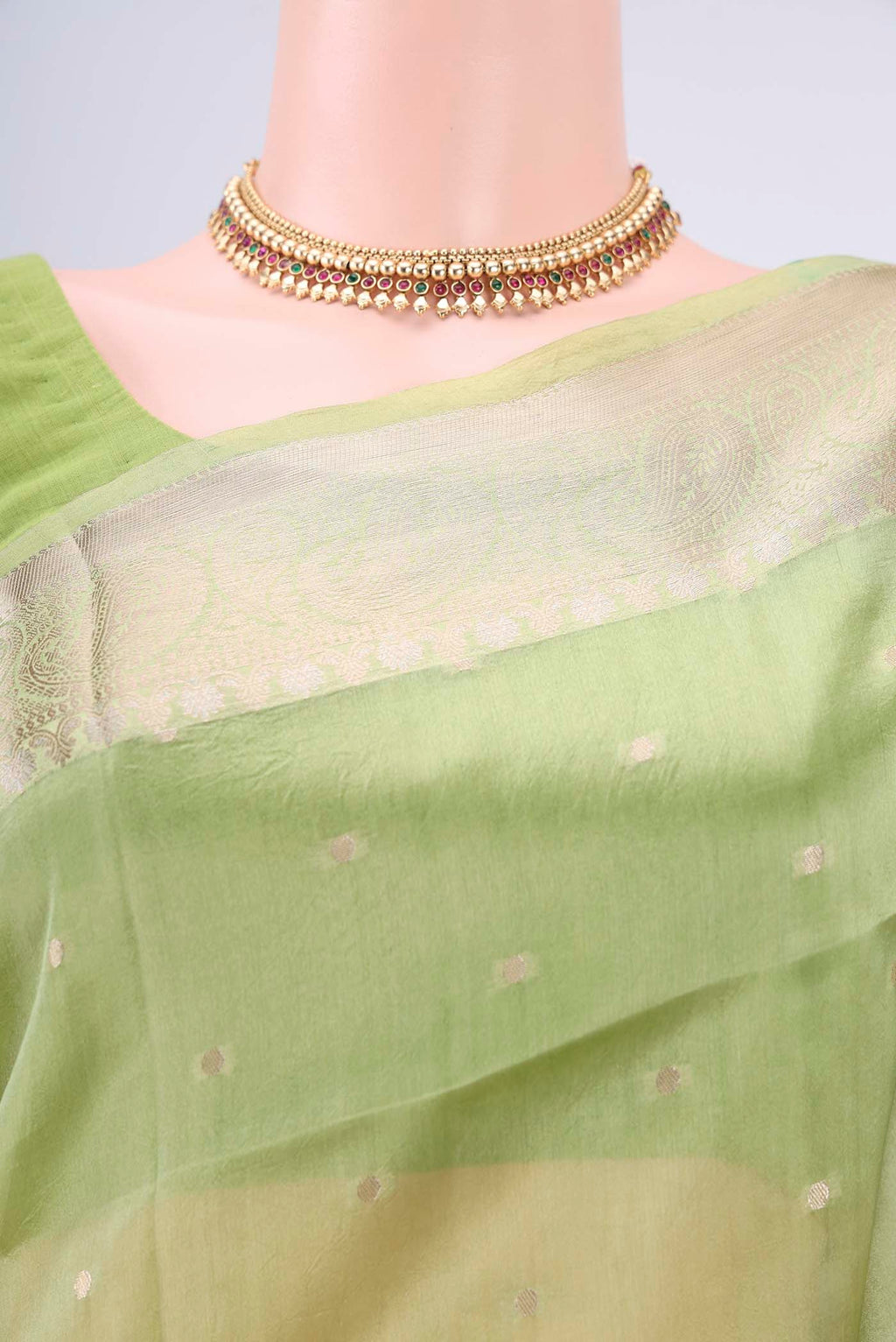 Border image of Light Green Banarasi Raw Silk Saree with Zari Butta on the body and Zari Border. 
