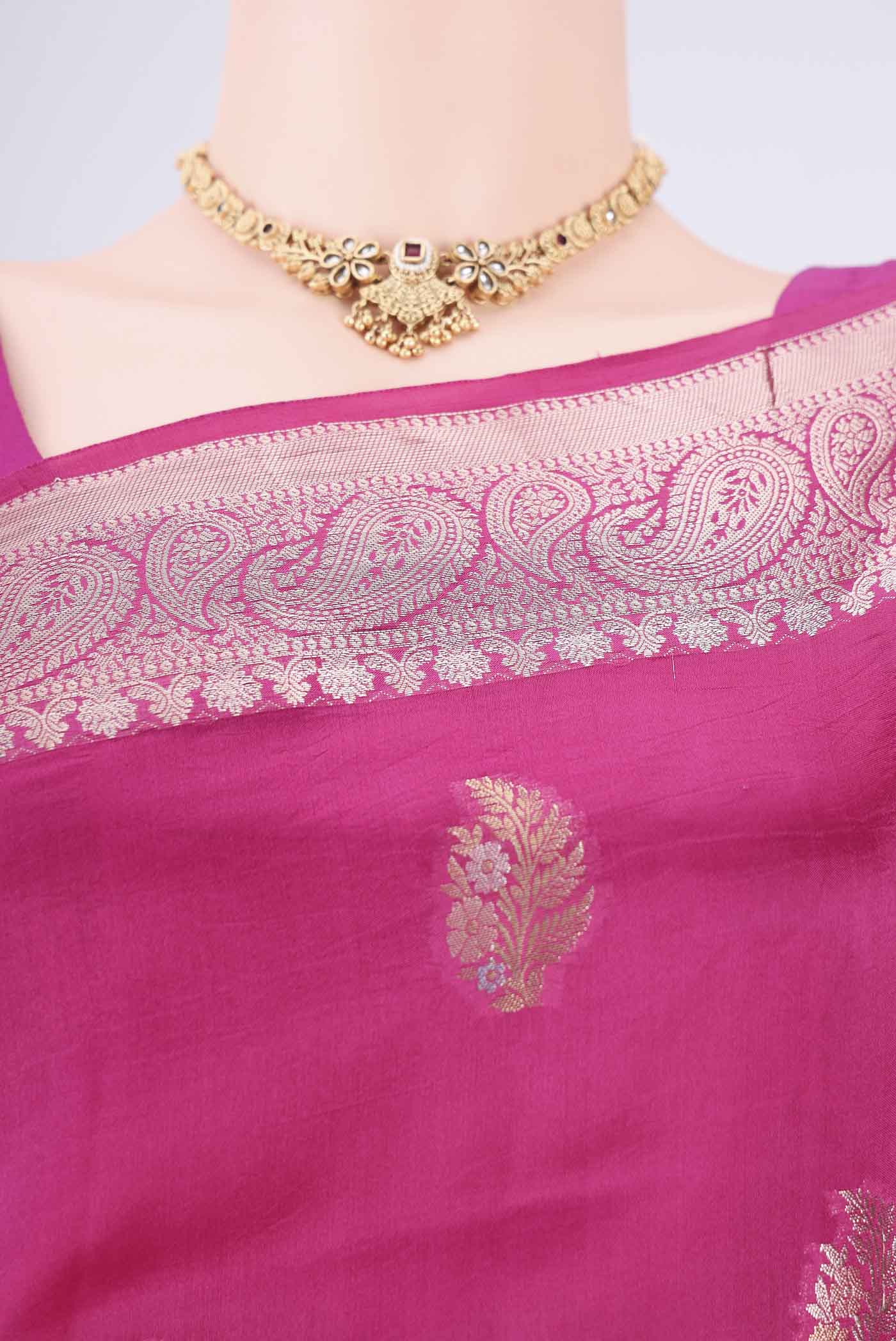 Border image of Dark Pink Banarasi Raw Silk Saree with Zari Butta on the body and Zari Border. 