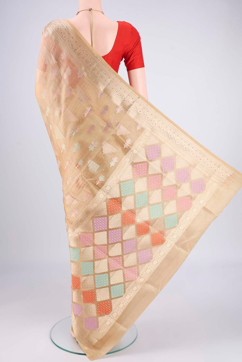 Flat view of Dark Beige Banarasi Raw Silk Saree with Zari Butta on the body and Zari Border. 