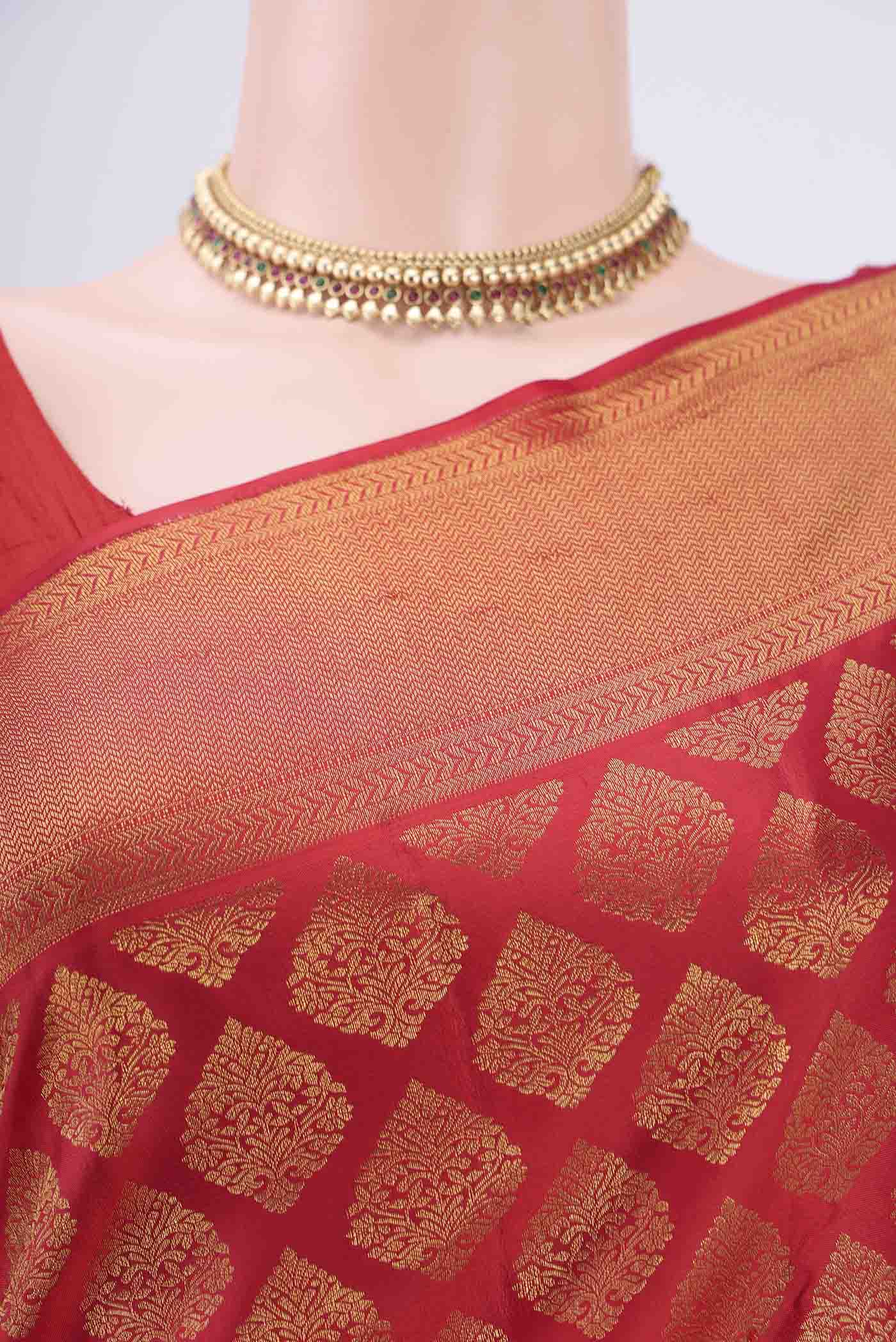 Border image of Red Kanjivaram Silk Saree with Zari Brocade on the body and Zari Border. 