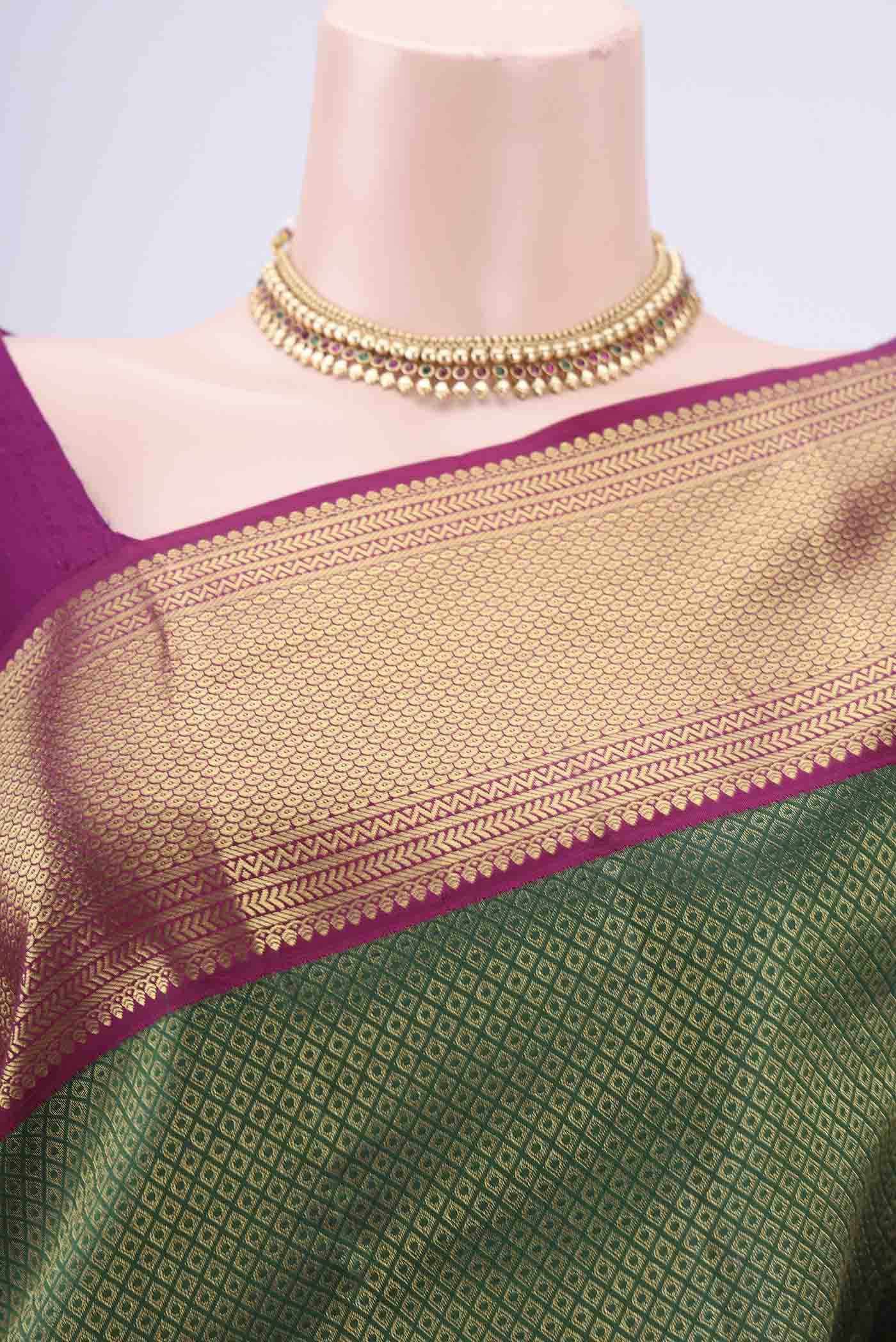 Border image of Bottle Green Kanjivaram Silk Saree with Zari Brocade on the body and Zari Border. 