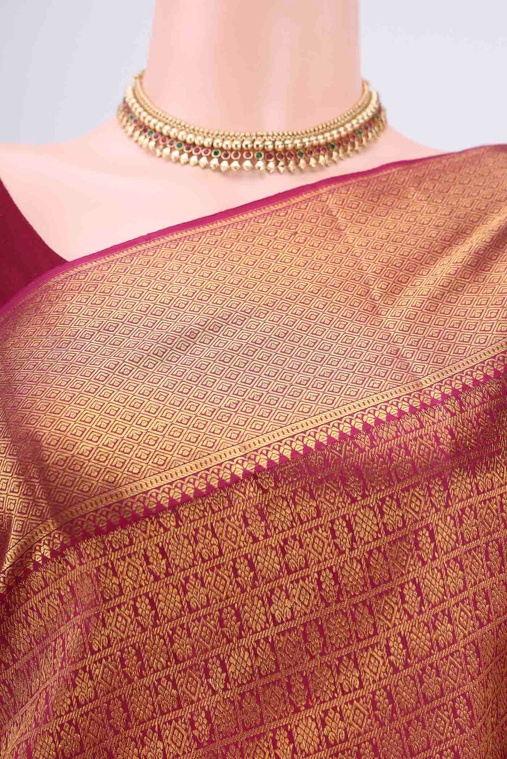Border image of Magenta Kanjivaram Silk Saree with Zari Brocade on the body and Zari Border. 