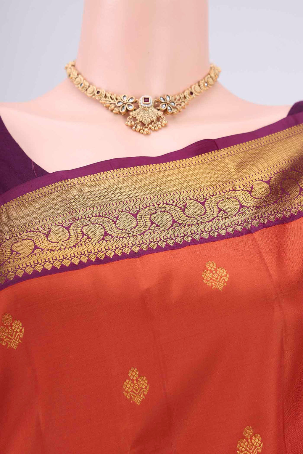 Border image of Orange Dual Tone Kanjivaram Silk Saree with Plain Body and Attached Border. 
