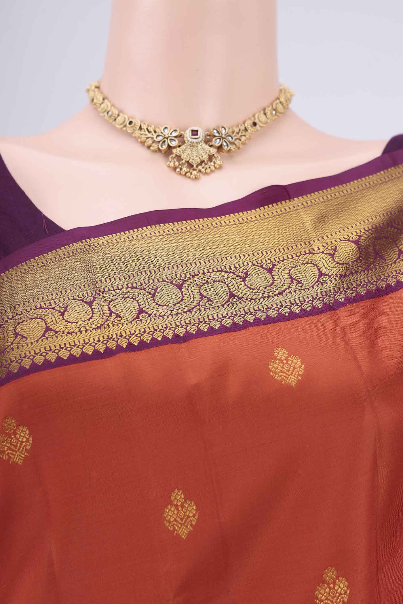 Border image of Orange Dual Tone Kanjivaram Silk Saree with Plain Body and Attached Border. 