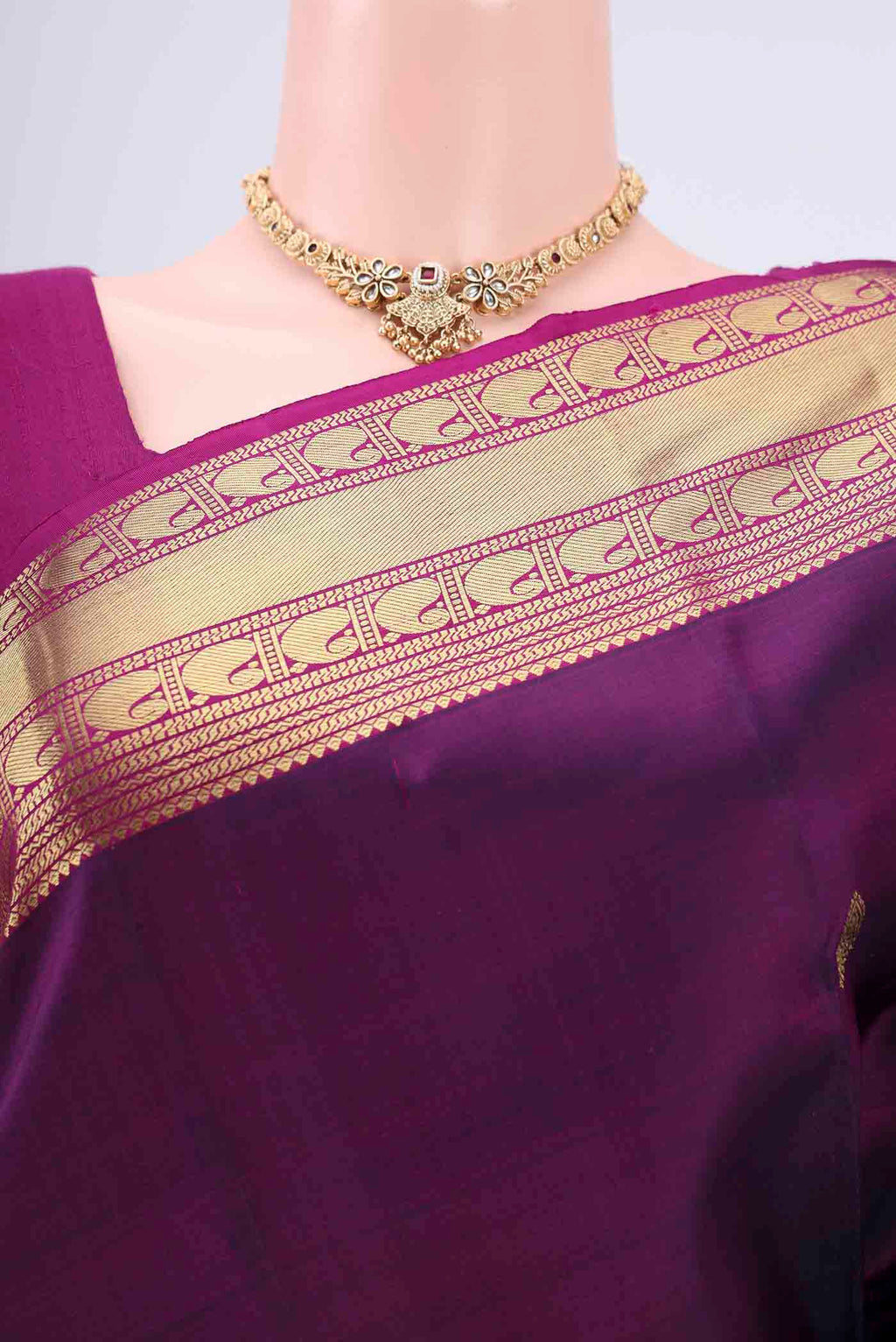Border image of Purple Kanjivaram Silk Saree with Zari Butta on the body and Zari Border. 