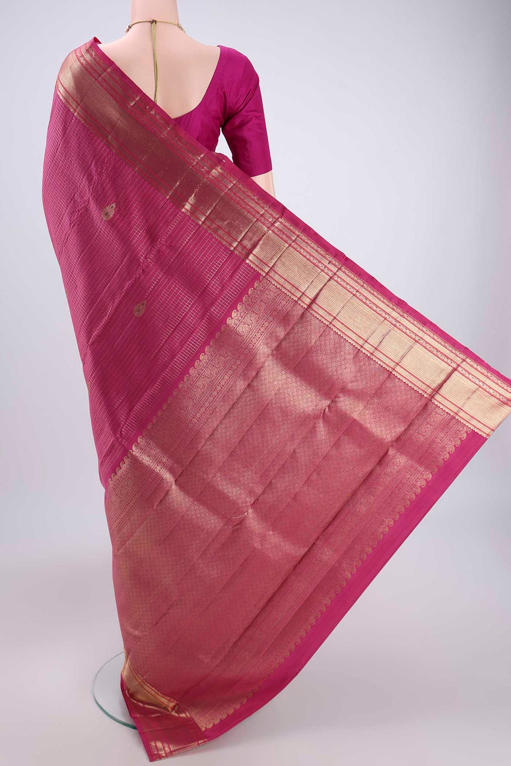 Flat view of Pink Kanjivaram Silk Saree with Checked design on the body and Zari And Thread Border. 