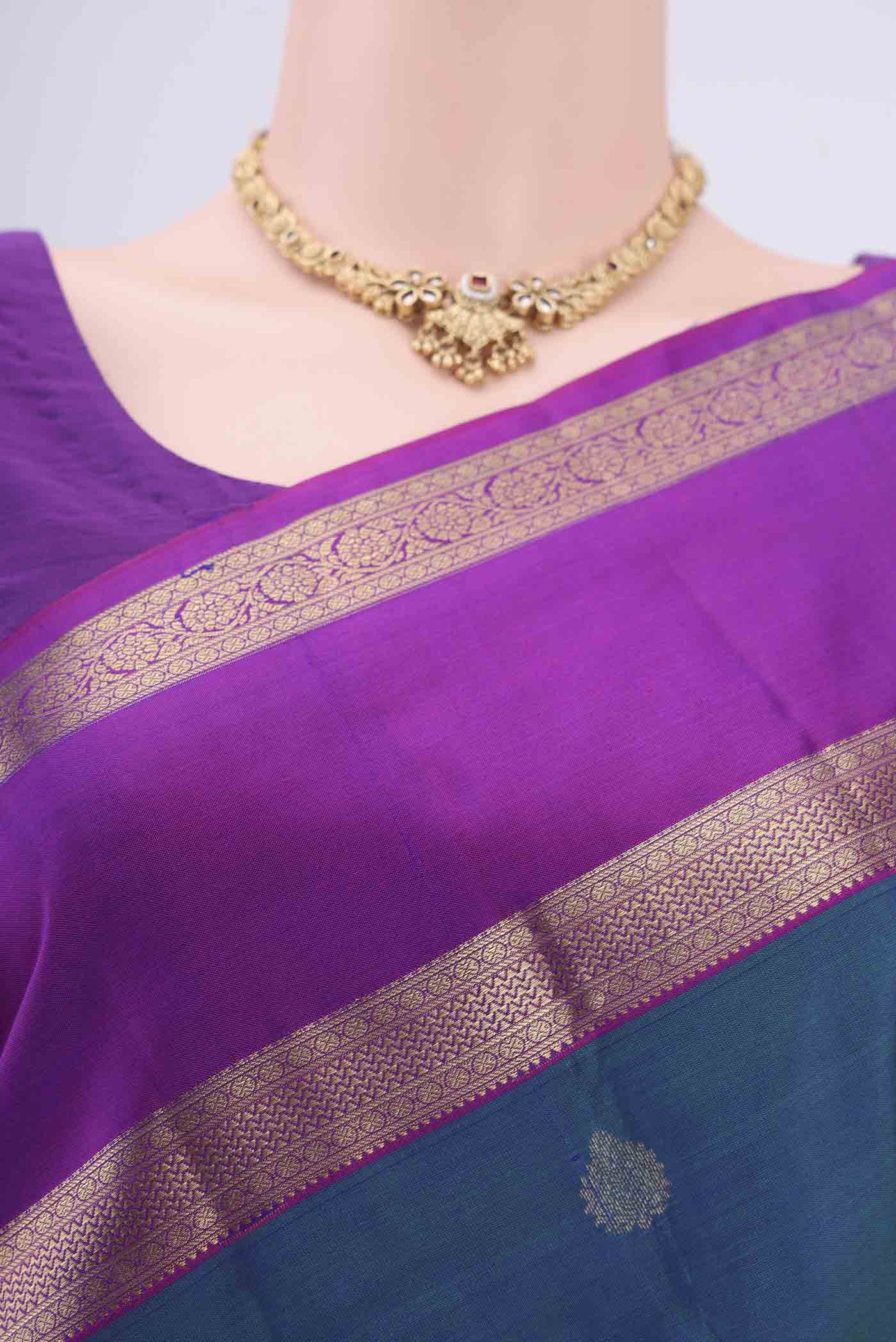 Border image of Peacock Blue Kanchipuram Silk Saree with Zari Butta on the body and Zari Border. 