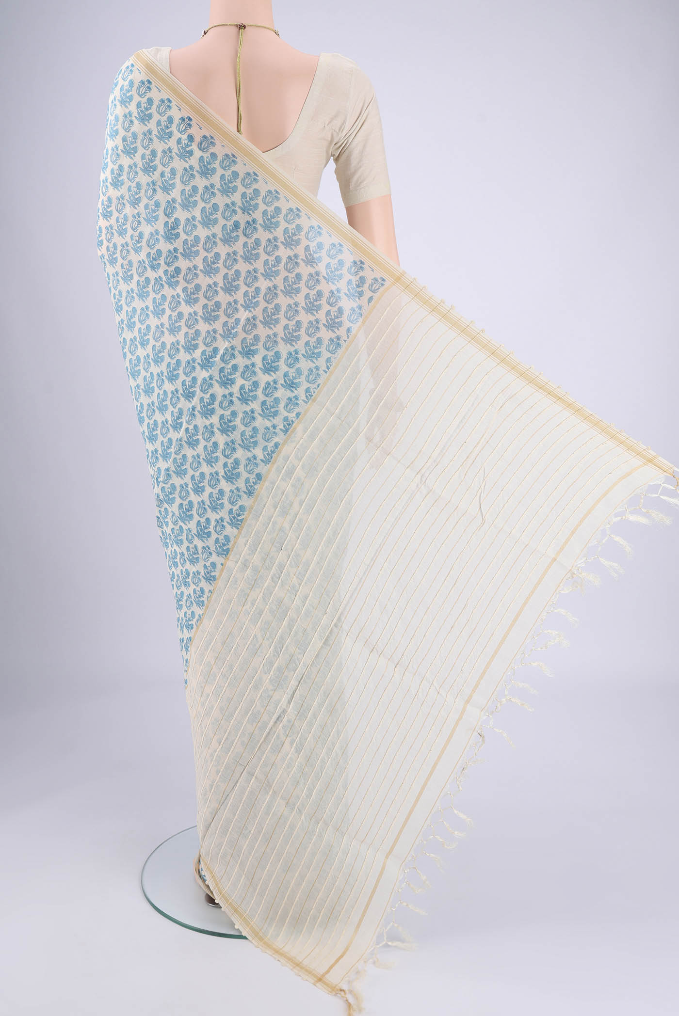 Flat view of Off White Tussar Silk Saree with Floral Print on the body and Thread Border. 