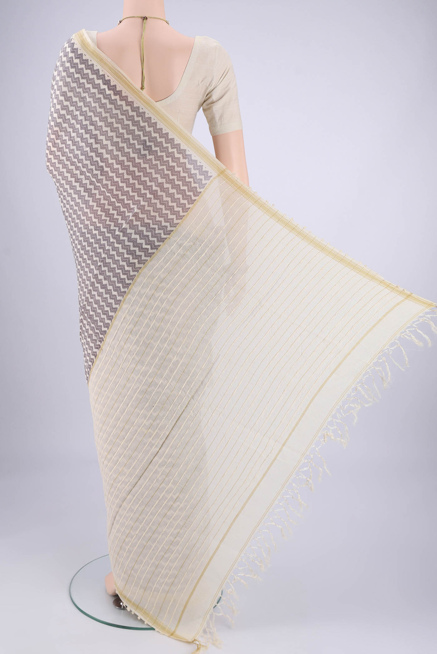 Flat view of Off White Tussar Silk Saree with Floral Print on the body and Thread Border. 