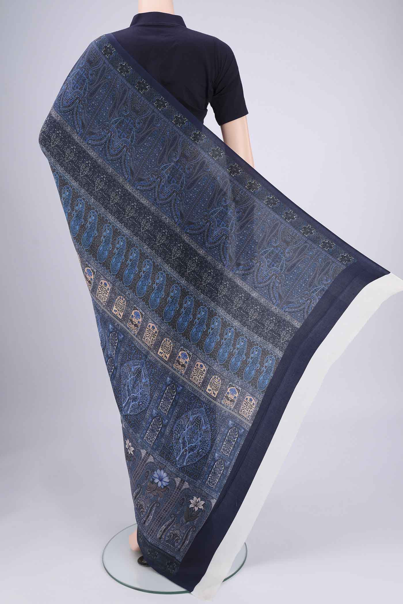 Flat view of Navy Blue Mysore Crepe Saree with Floral Print on the body and Zari Border. 