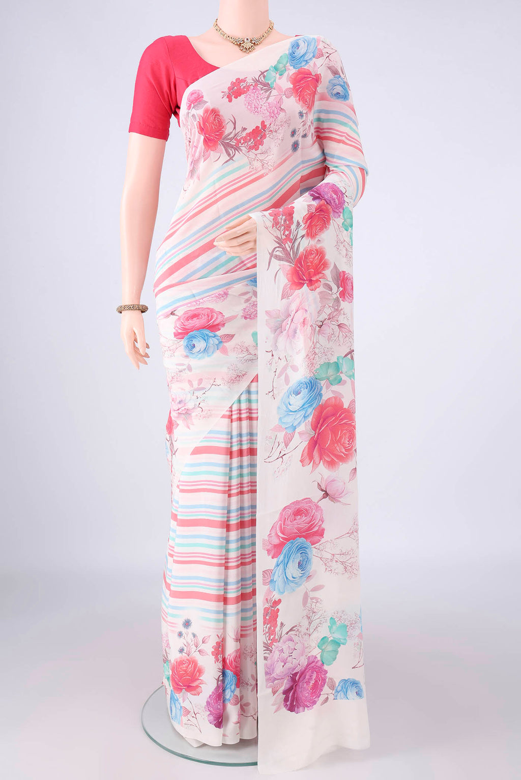 White Mysore Crepe Saree with Floral Print on the body and Without Border.  displayed on a mannequin