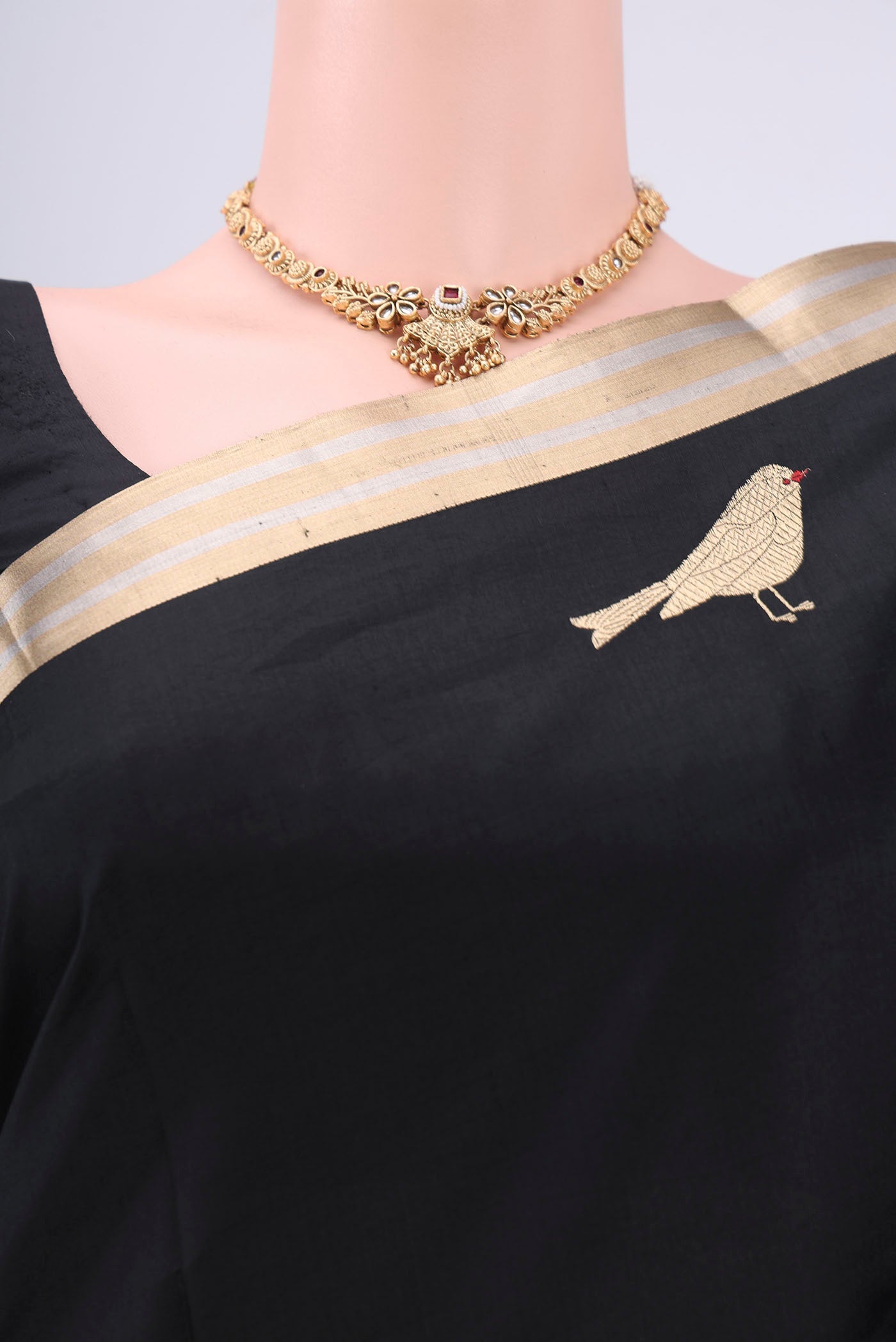 Border image of Black Banarasi Katan Silk Saree with Zari Butta on the body and Zari Border. 
