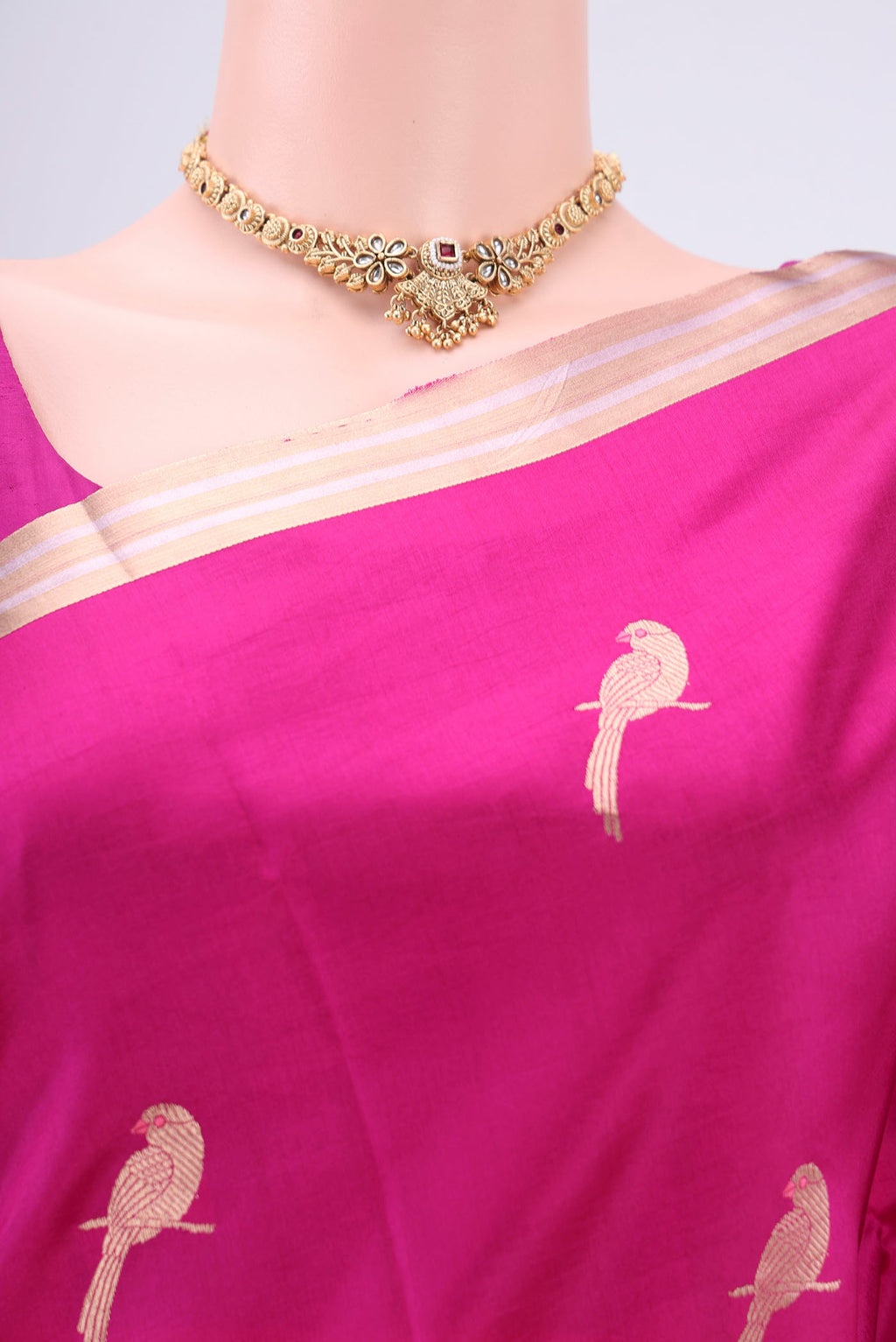 Border image of Rani Pink Banarasi Katan Silk Saree with Zari And Thread Butta on the body and Zari Border. 