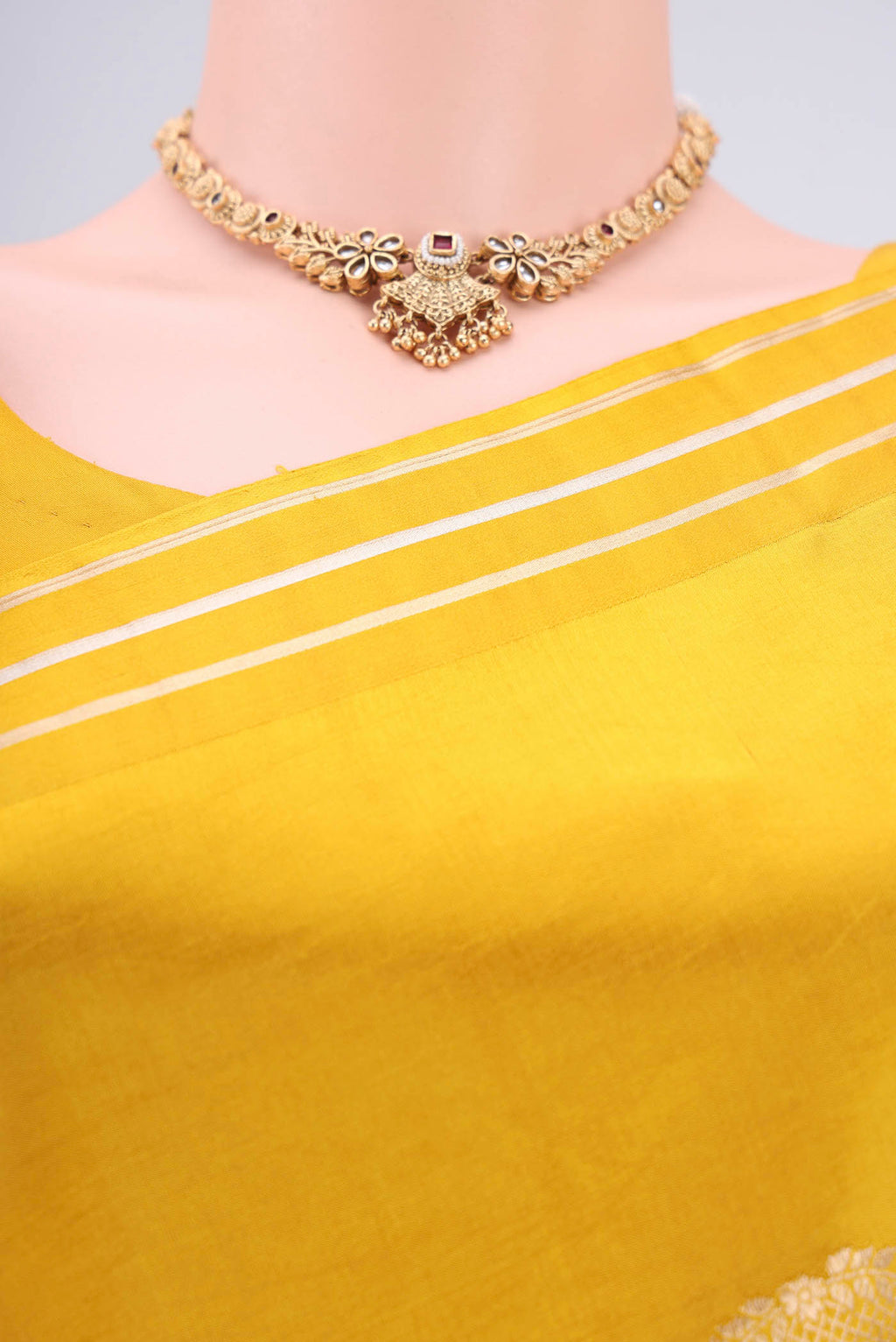 Border image of Lemon Yellow Banarasi Katan Silk Saree with Zari Butta on the body and Zari Border. 