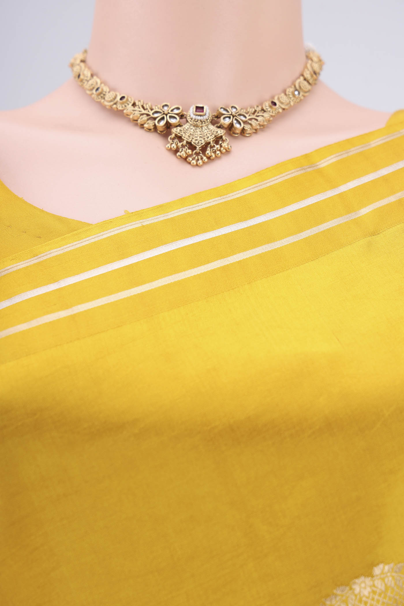 Border image of Lemon Yellow Banarasi Katan Silk Saree with Zari Butta on the body and Zari Border. 