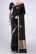 Pure Silk Black Banarasi Saree with Zari Butta on the body and Zari Border.  displayed on a mannequin