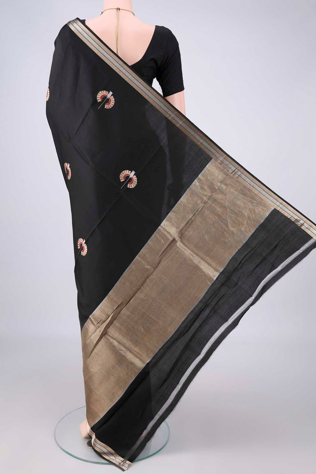 Flat view of Pure Silk Black Banarasi Saree with Zari Butta on the body and Zari Border. 