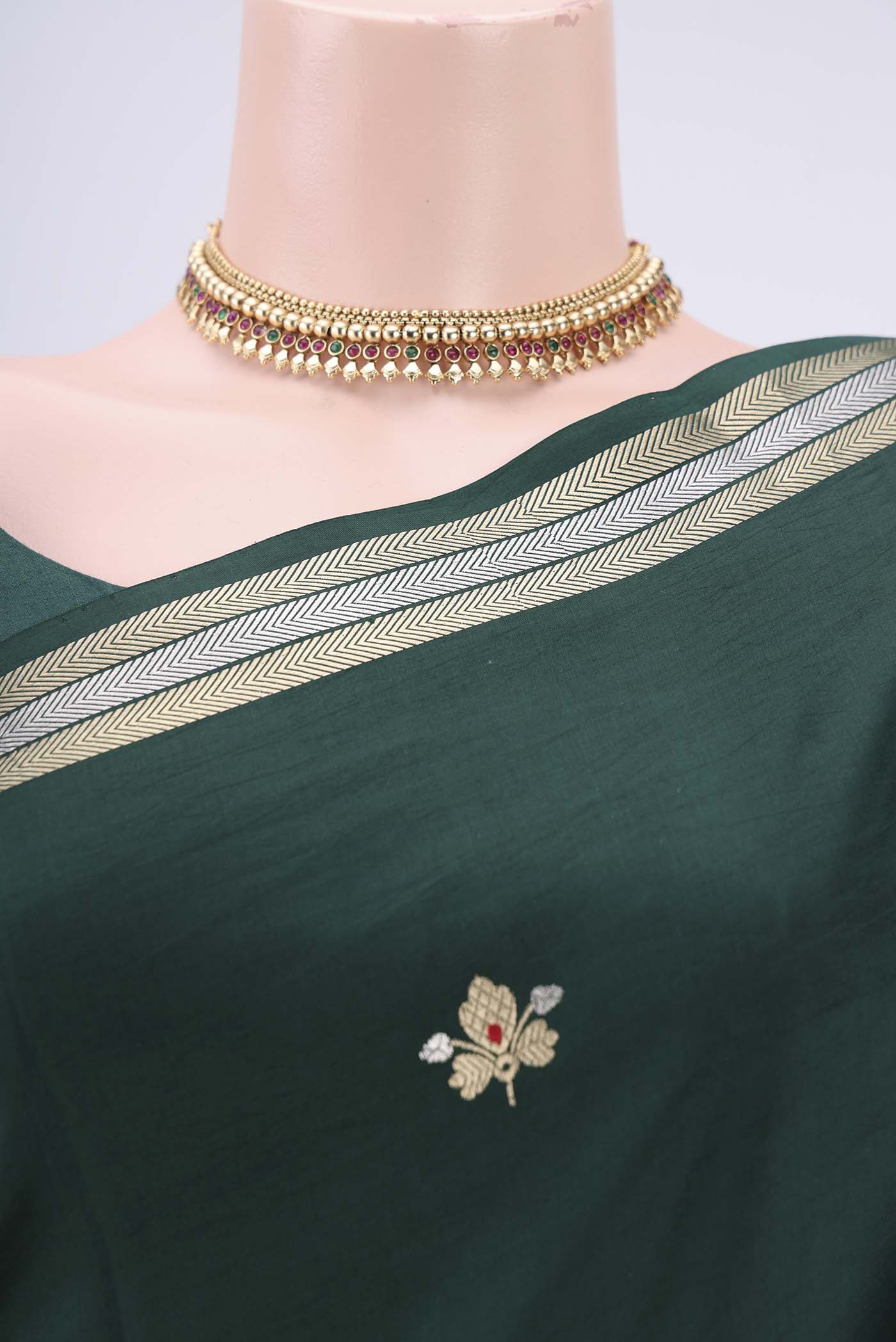 Border image of Bottle Green Banarasi Katan Silk Saree with Zari Butta on the body and Zari Border. 