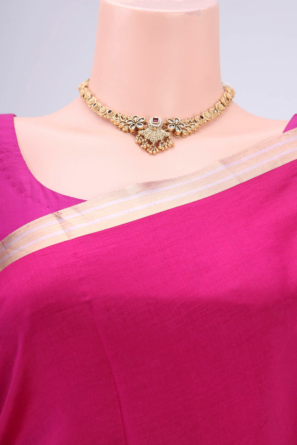 Border image of Rani Pink Banarasi Katan Silk Saree with Zari Butta on the body and Zari Border. 