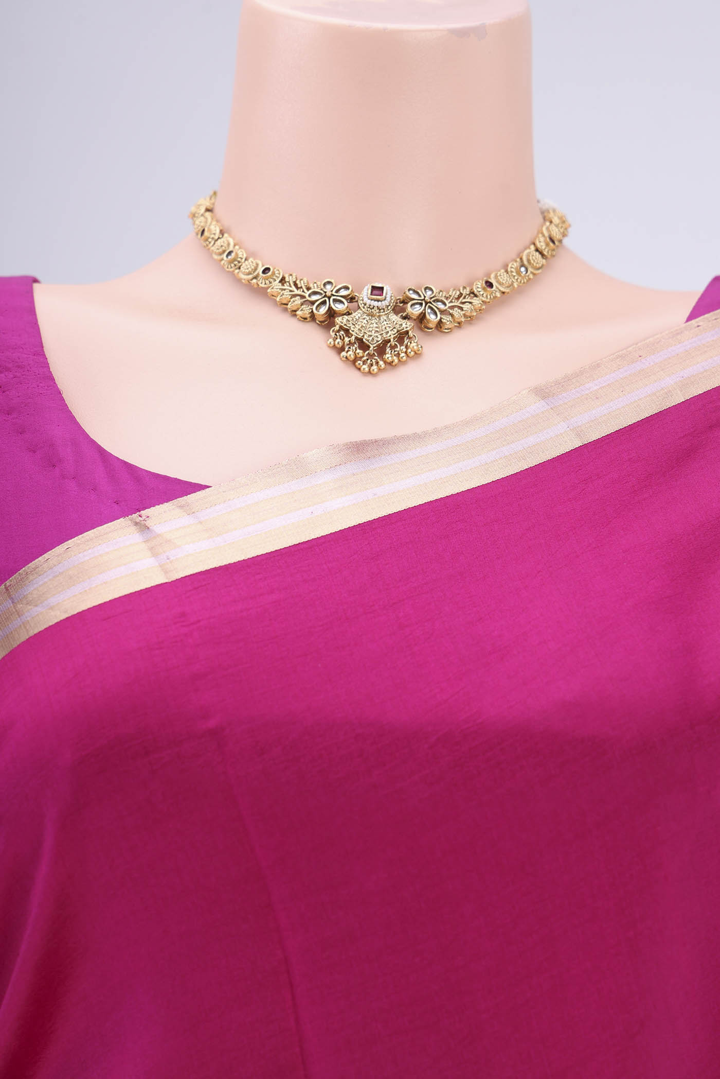 Border image of Rani Pink Banarasi Katan Silk Saree with Zari Butta on the body and Zari Border. 
