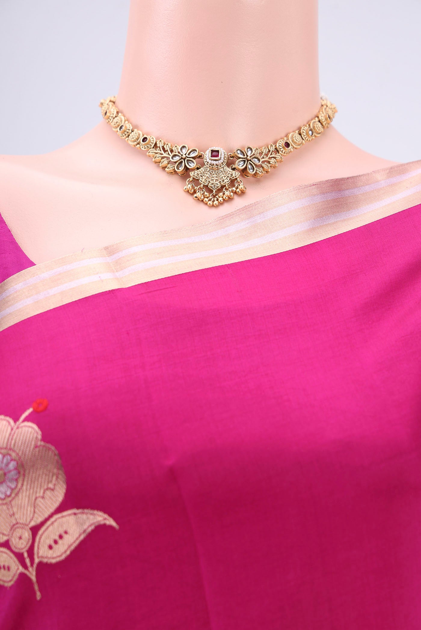 Border image of Rani Pink Banarasi Katan Silk Saree with Zari And Thread Butta on the body and Zari Border. 