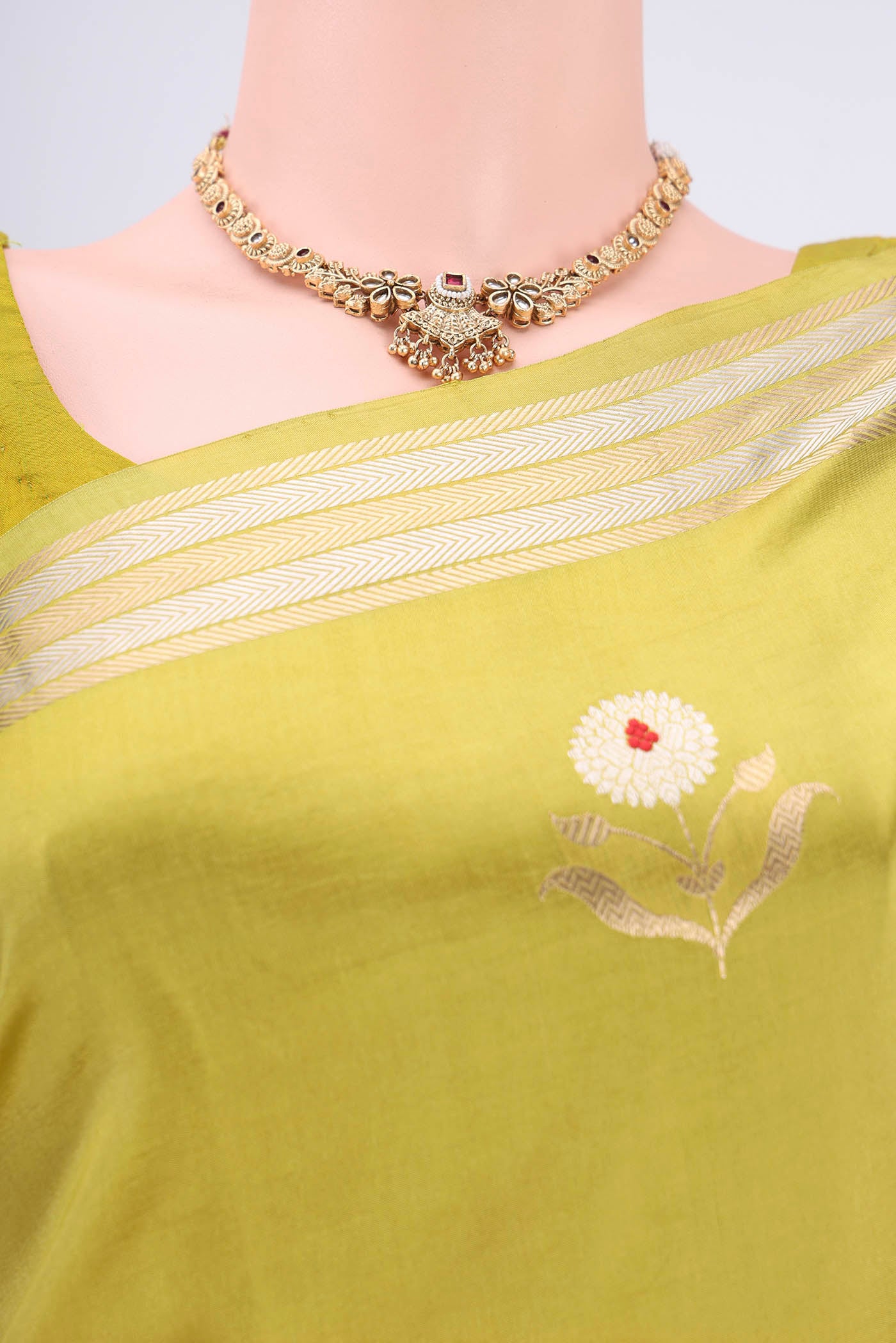Border image of Light Green Banarasi Katan Silk Saree with Zari And Thread Butta on the body and Zari Border. 