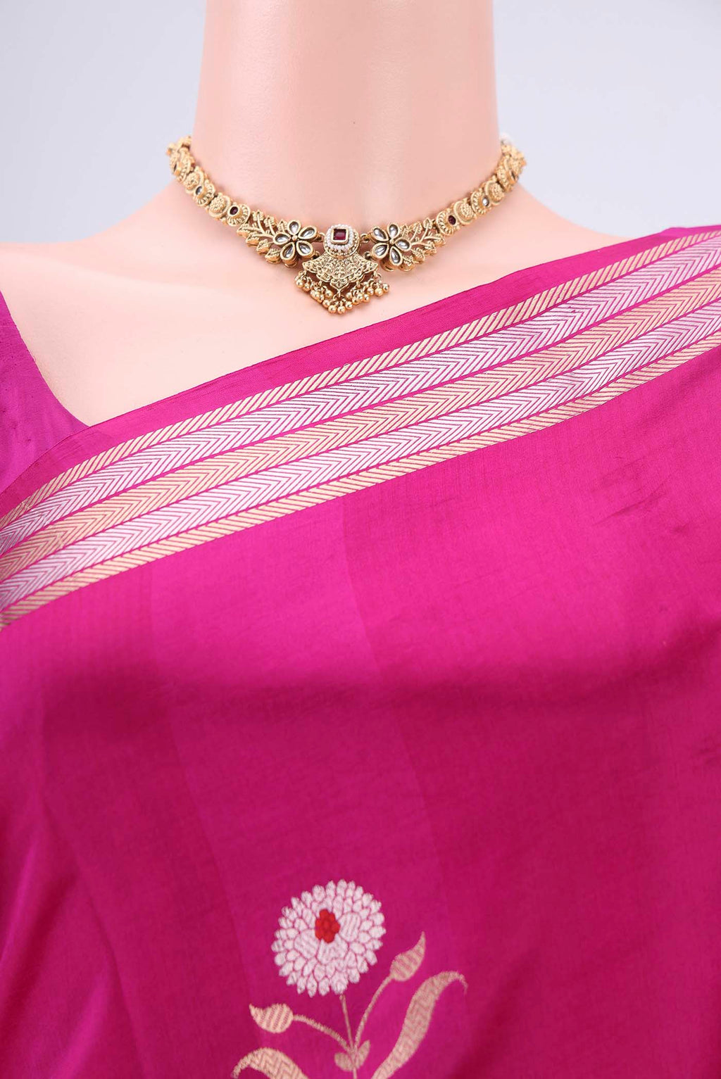 Border image of Rani Pink Banarasi Katan Silk Saree with Zari And Thread Butta on the body and Zari Border. 