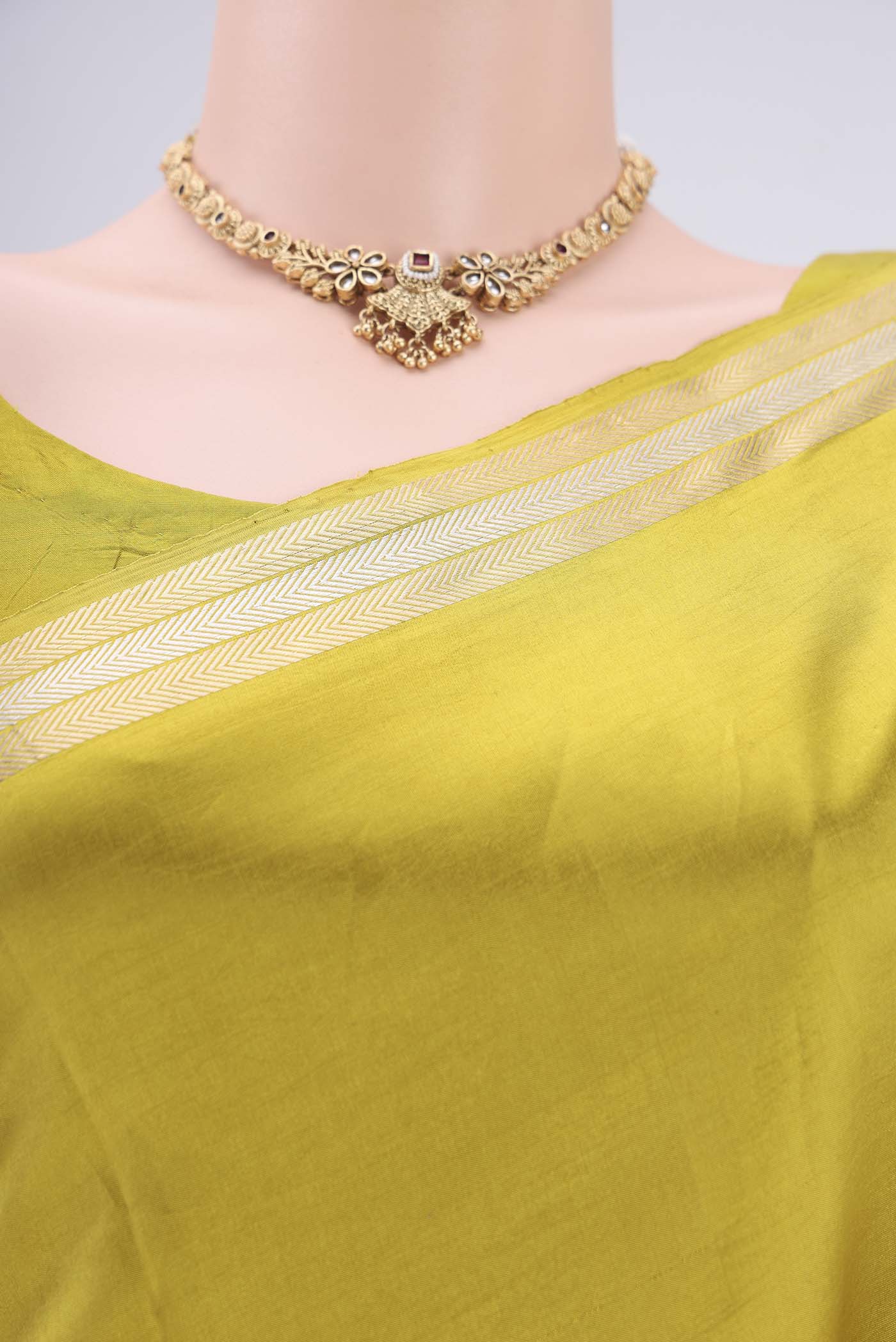 Border image of Light Green Banarasi Katan Silk Saree with Zari Butta on the body and Zari Border. 