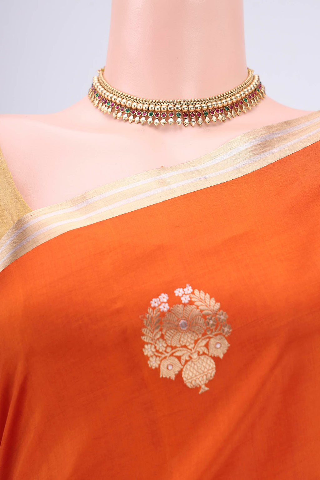 Border image of Rust Banarasi Katan Silk Saree with Zari Butta on the body and Zari Border. 