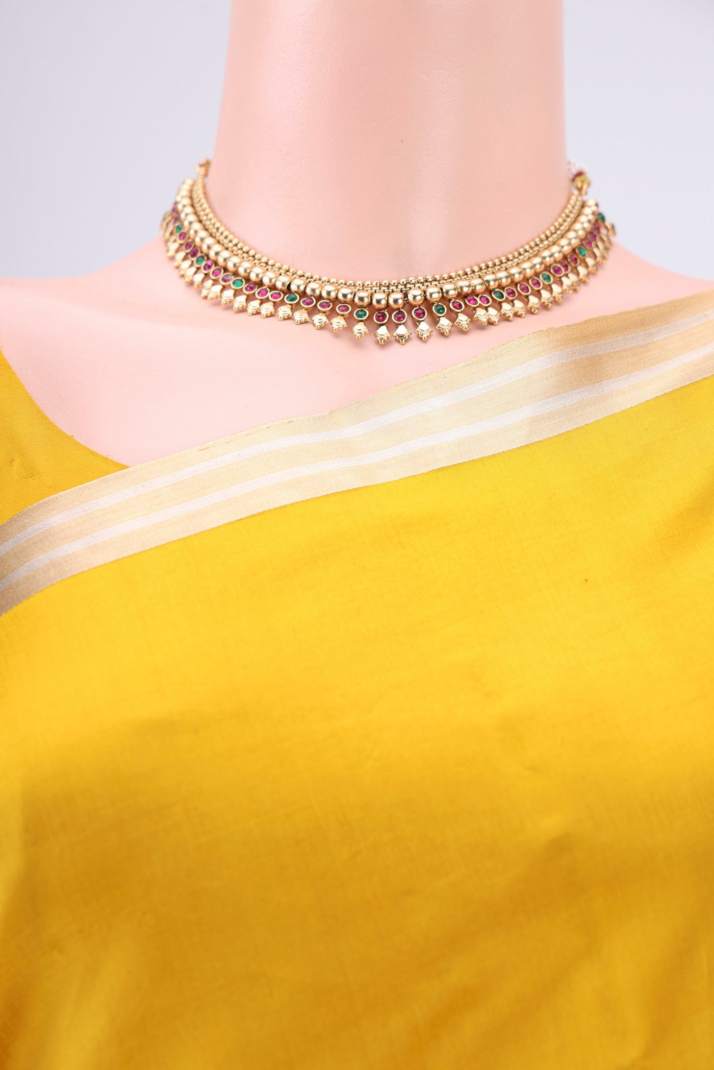 Border image of Mustard Banarasi Katan Silk Saree with Zari Butta on the body and Zari Border. 