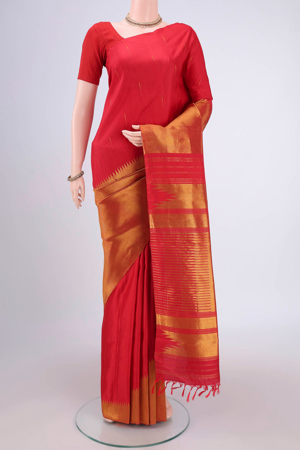 Red Dual Tone Kanjivaram Silk Saree with Zari Brocade on the body and Temple Border.  displayed on a mannequin
