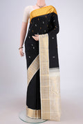 Black Dual Tone Kanjivaram Silk Saree with Plain Body and Ganga Jamuna Border.  displayed on a mannequin