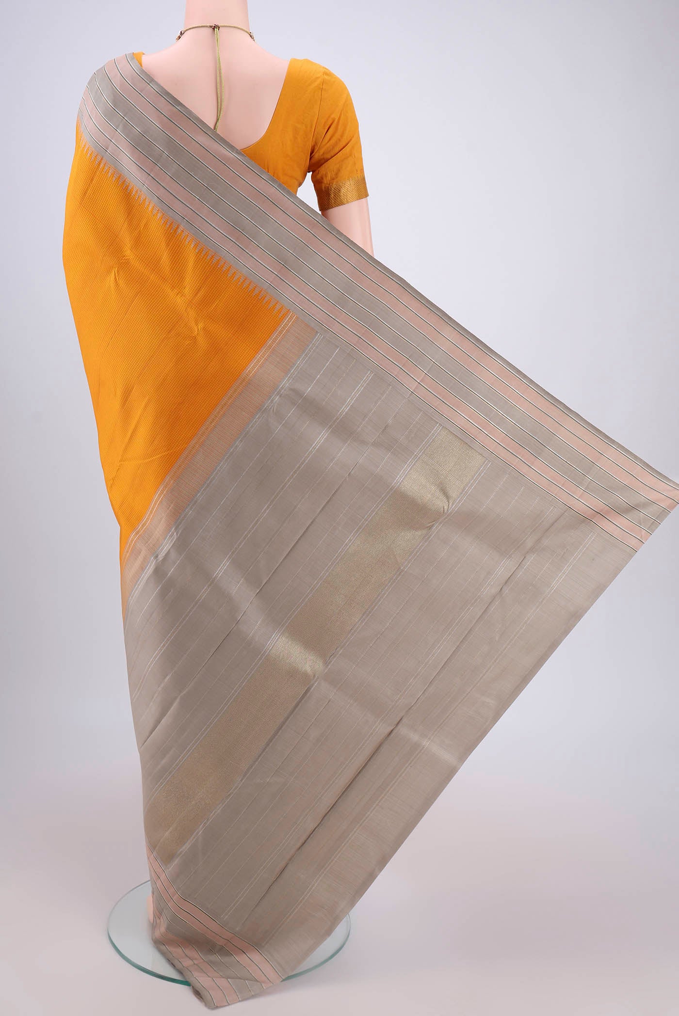 Flat view of Yellow Dual Tone Kanjivaram Silk Saree with Checked design on the body and Zari Border. 