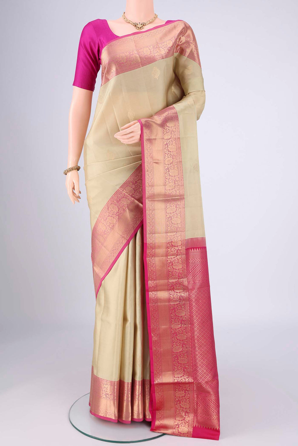 Sage Green Dual Tone Soft Silk Saree with Zari Brocade on the body and Zari Border.  displayed on a mannequin