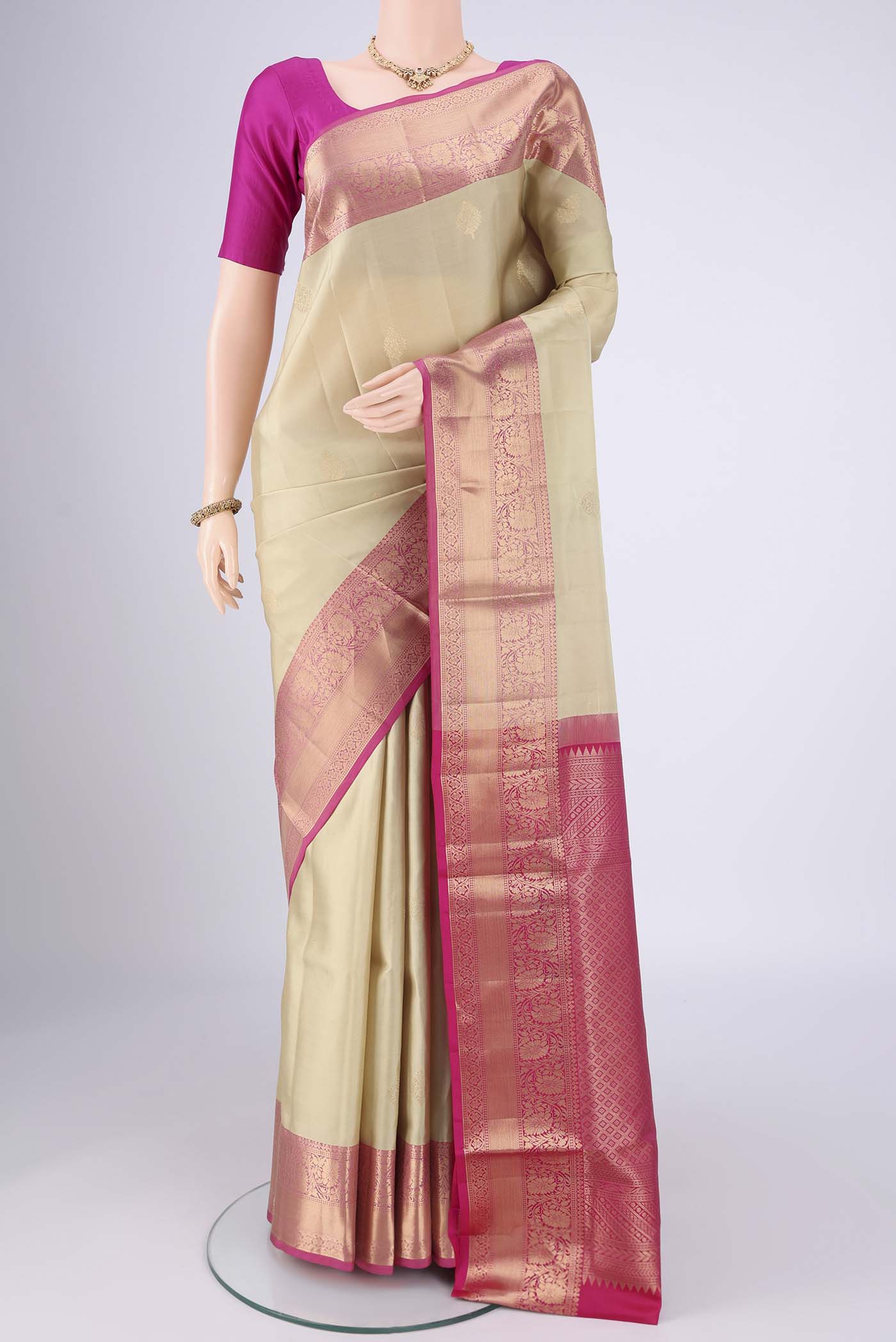 Sage Green Dual Tone Soft Silk Saree with Zari Brocade on the body and Zari Border.  displayed on a mannequin