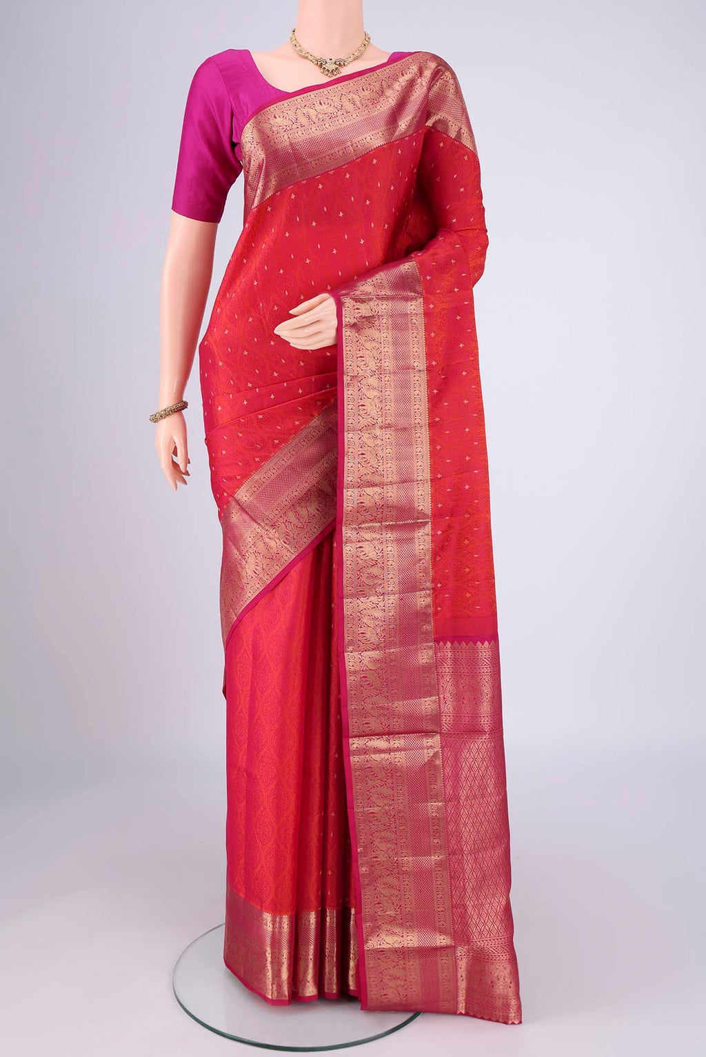Dark Pink Dual Tone Soft Silk Saree with Jacquard With Zari Butta on the body and Zari Border.  displayed on a mannequin