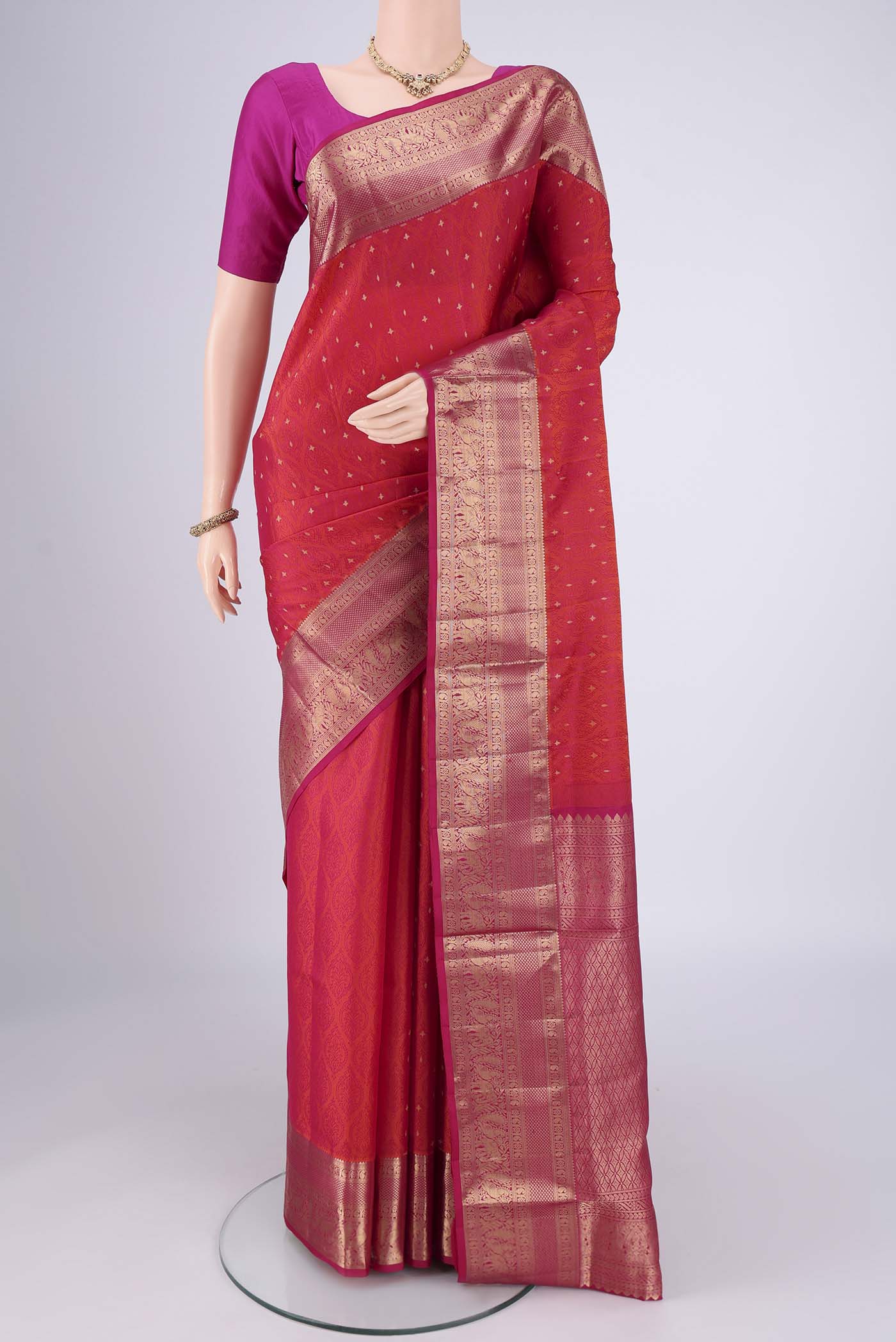 Dark Pink Dual Tone Soft Silk Saree with Jacquard With Zari Butta on the body and Zari Border.  displayed on a mannequin
