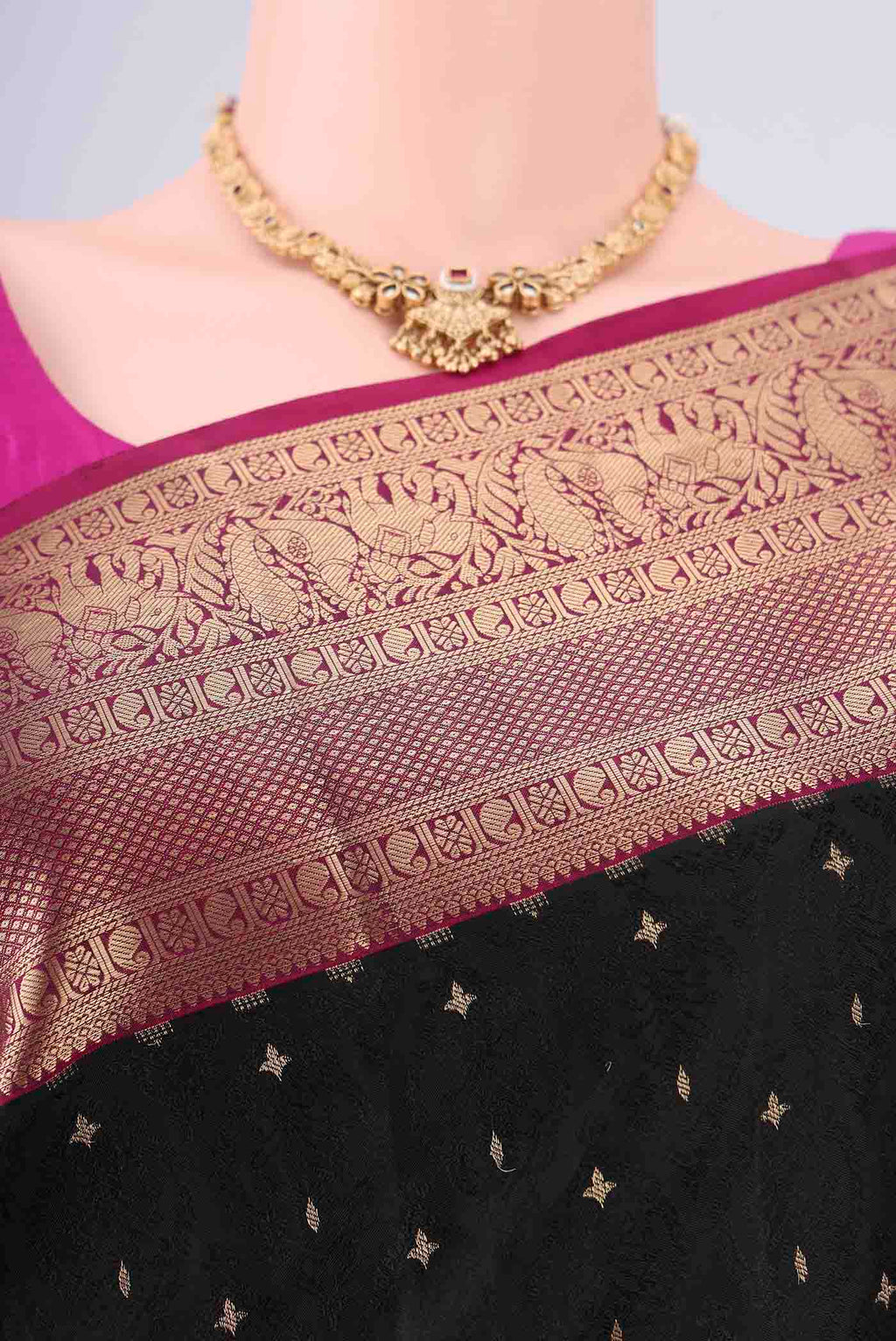 Border image of Black Dual Tone Soft Silk Saree with Jacquard With Zari Butta on the body and Zari Border. 