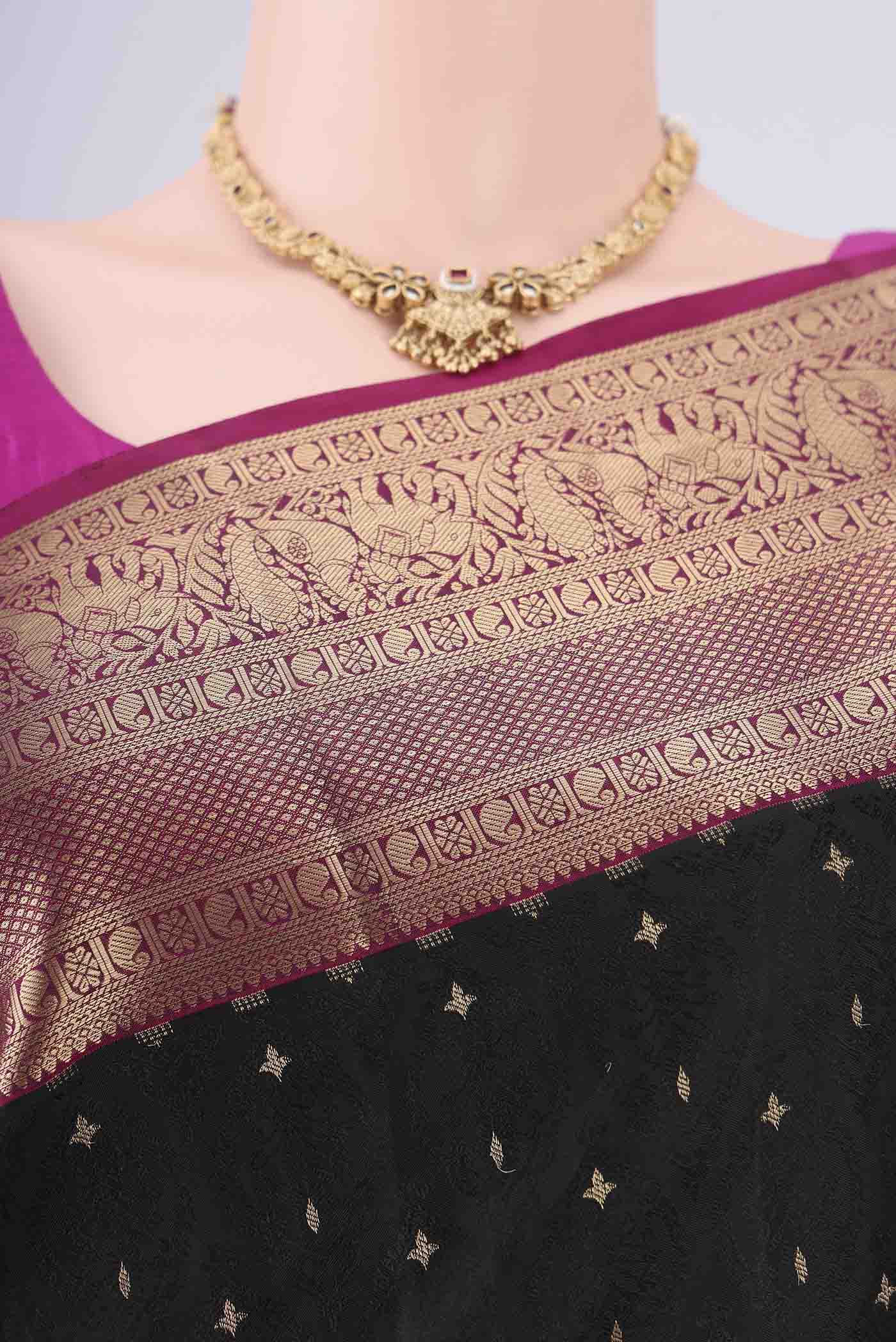 Border image of Black Dual Tone Soft Silk Saree with Jacquard With Zari Butta on the body and Zari Border. 